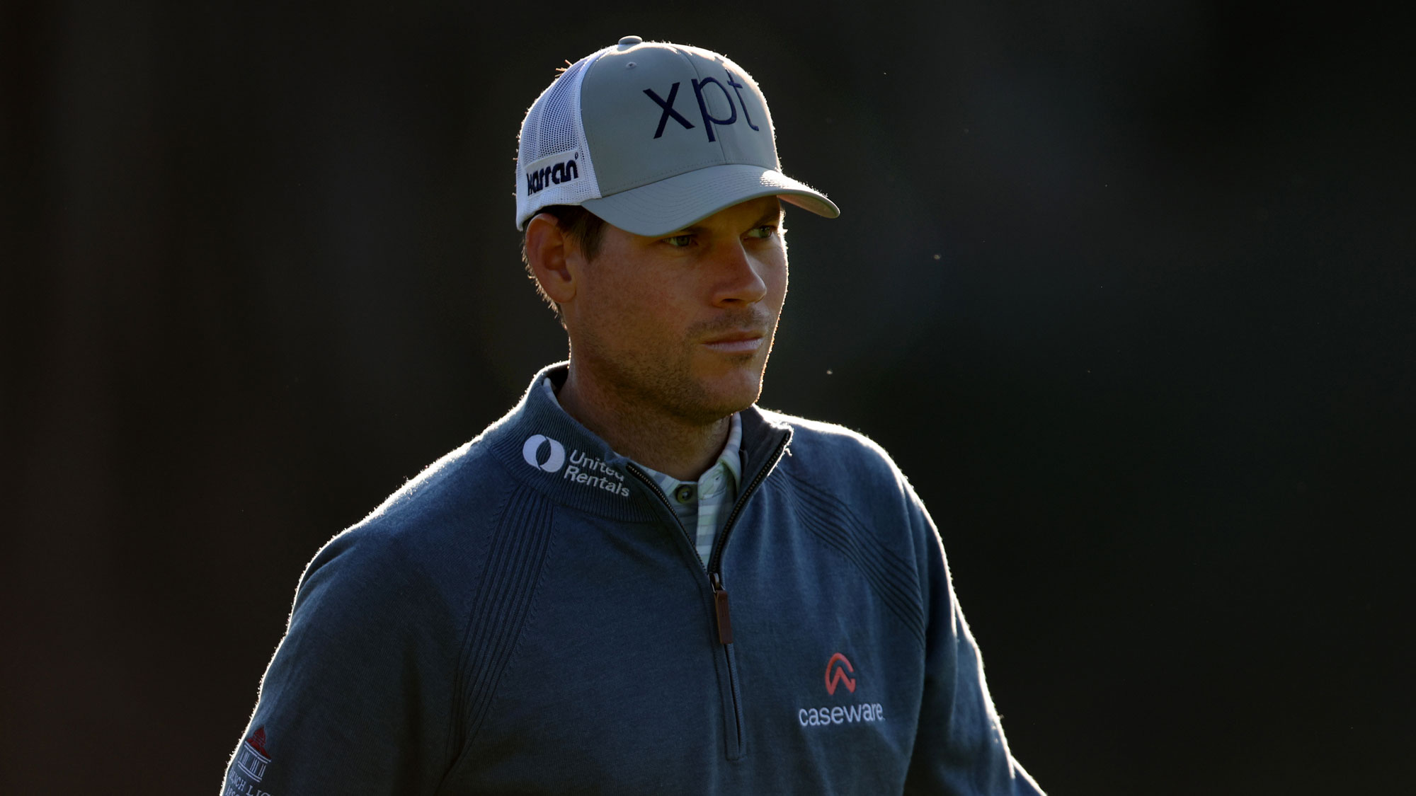 Adam Schenk of the United States walks from the second tee during the first round of The Genesis Invitational
