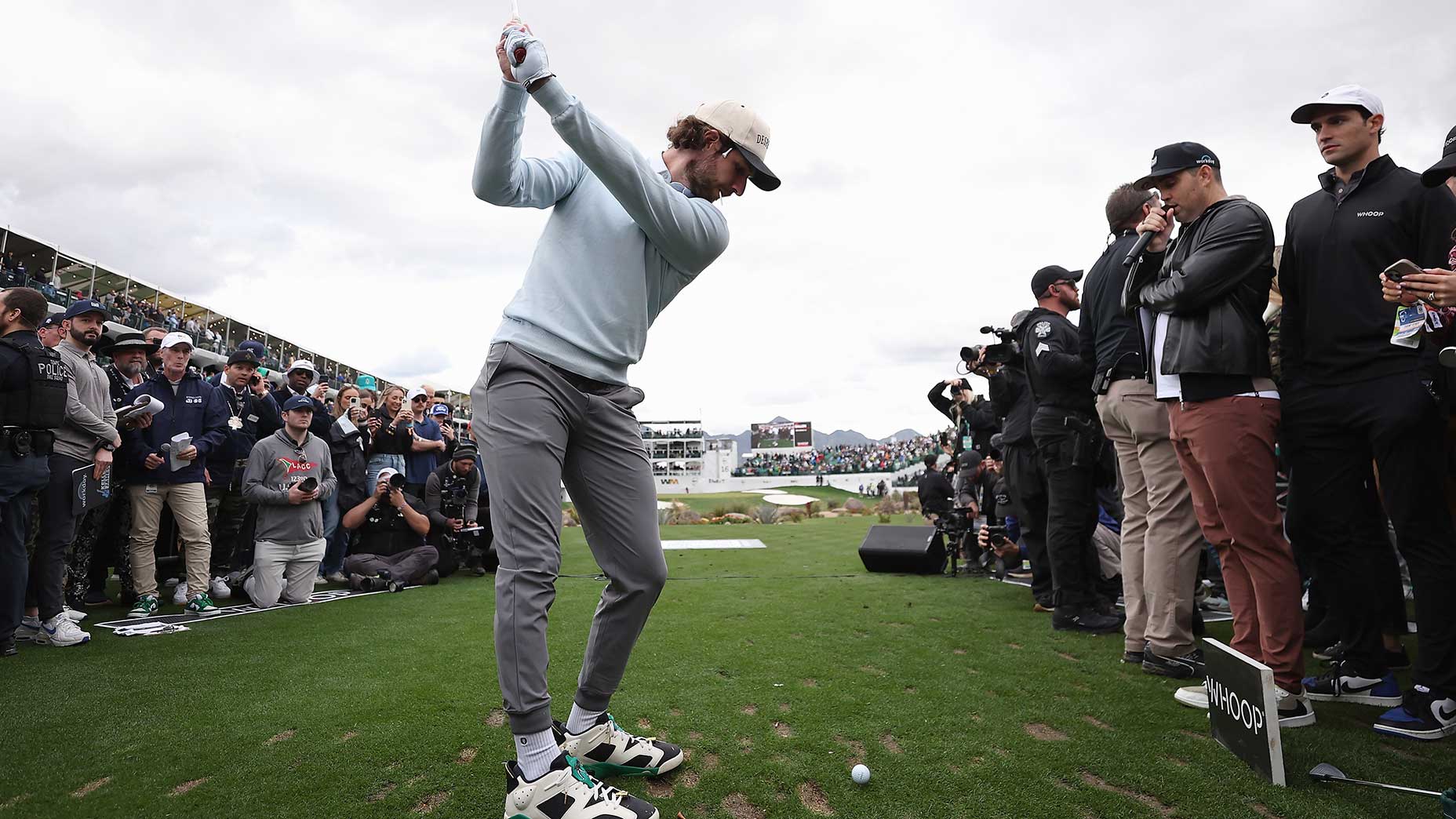 Arizona Diamondbacks pitcher Zac Gallen tees off on the 16th hole ahead of the WM Phoenix Open at TPC Scottsdale on Feb. 7, 2024.