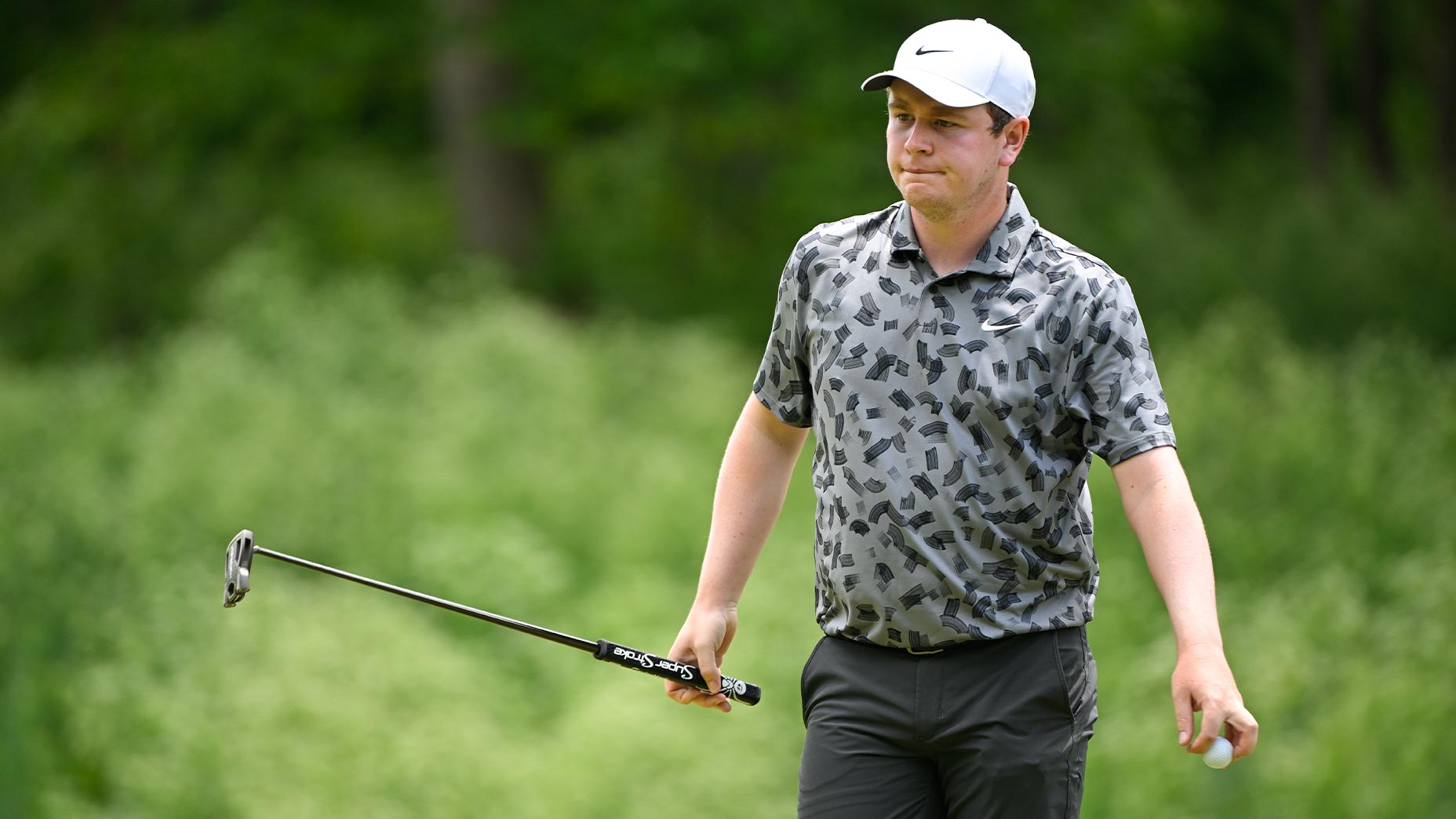 Robert MacIntyre walks in gray at the PGA Championship.