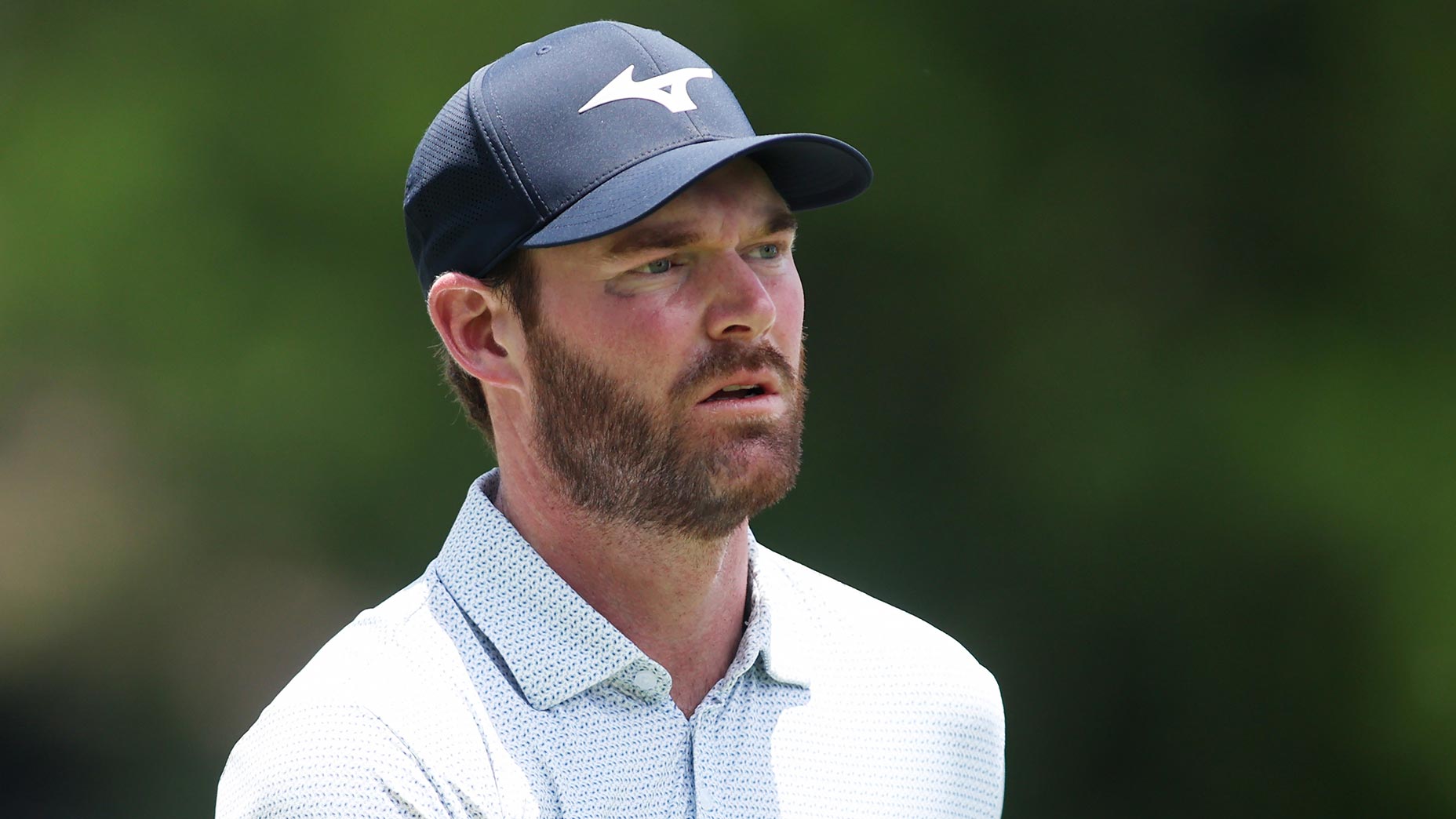 grayson murray stares at the charles schwab challenge in navy hat
