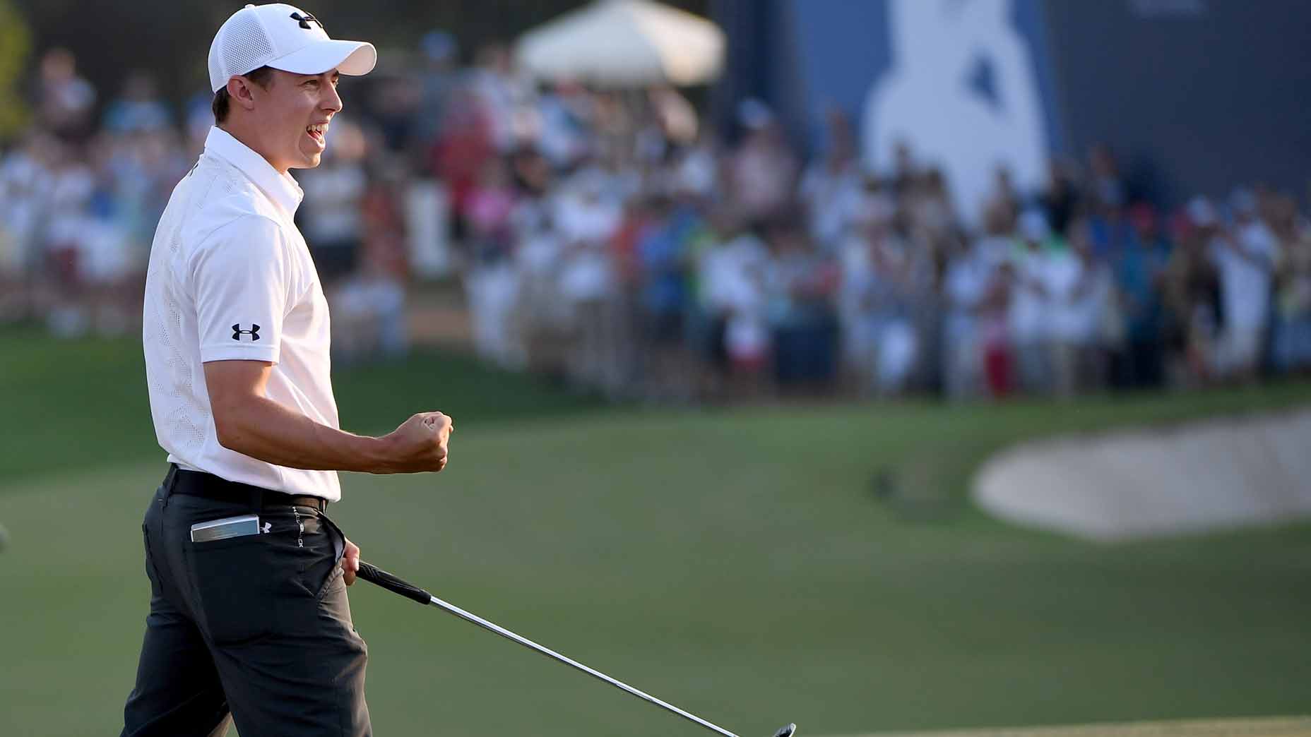 Matthew Fitzpatrick of England celebrates after holing the winning putt to win the DP World Tour Championship during the final round of the 2016 DP World Tour Championship