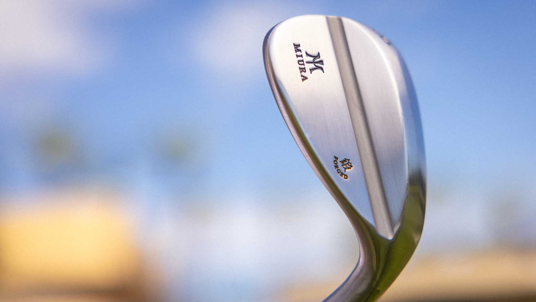 The backside of Miura's forged wedge in a raw finish.