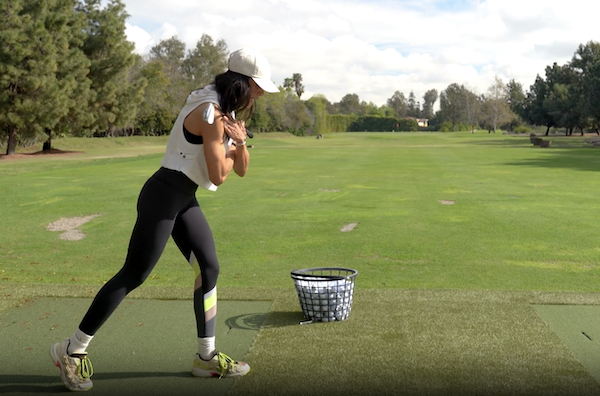 Veronica Felibert shares a coil golf stretch for warming up