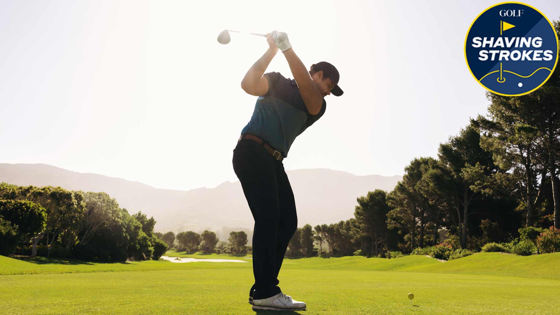 Golfer at top of backswing