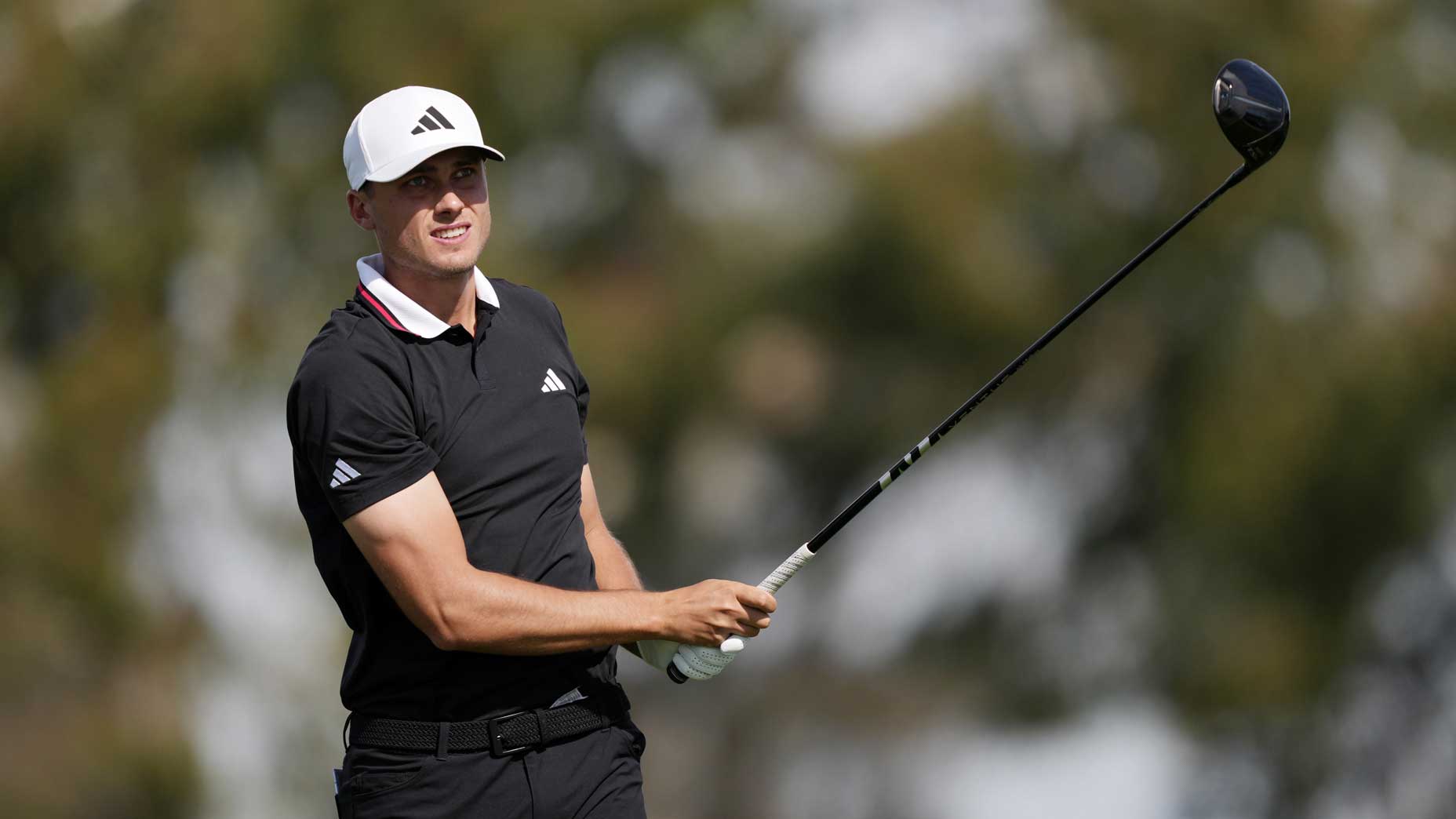 Ludvig Aberg watches a shot at the Genesis.