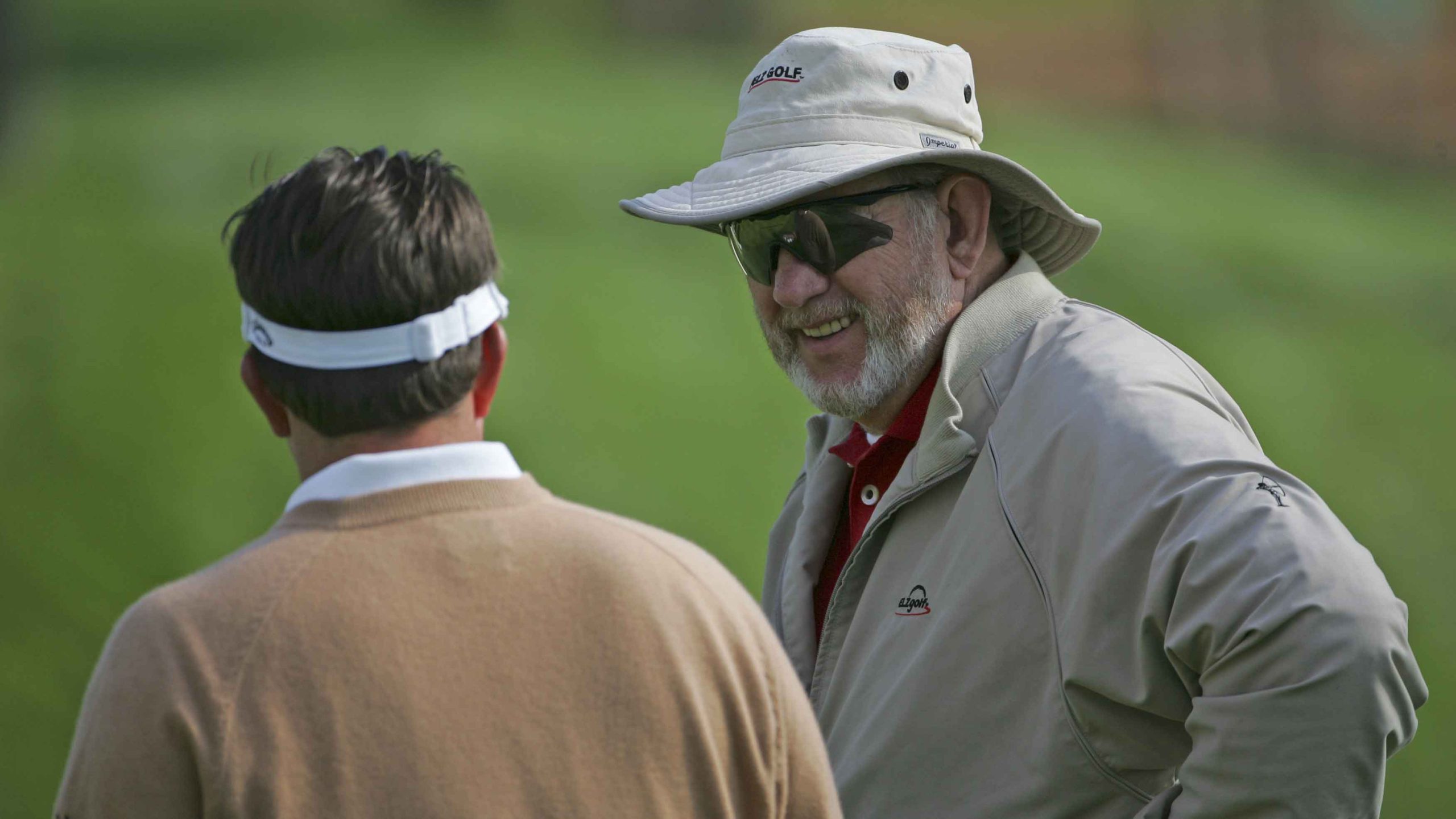 Phil Mickelson works with short-game coach Dave Pelz during an early practice round on the stadium course Saturday, in preparation for the 2005 THE PLAYERS Championship