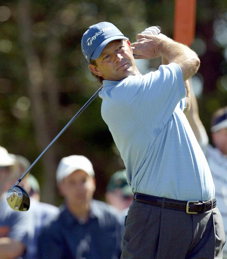 South African golfer and leader Retief Goosen tees off on the 3rd hole during the final round of play at the 2004 US Open Championship at Shinnecock Hills Golf Club in Southampton, New York, 20 June 2004.