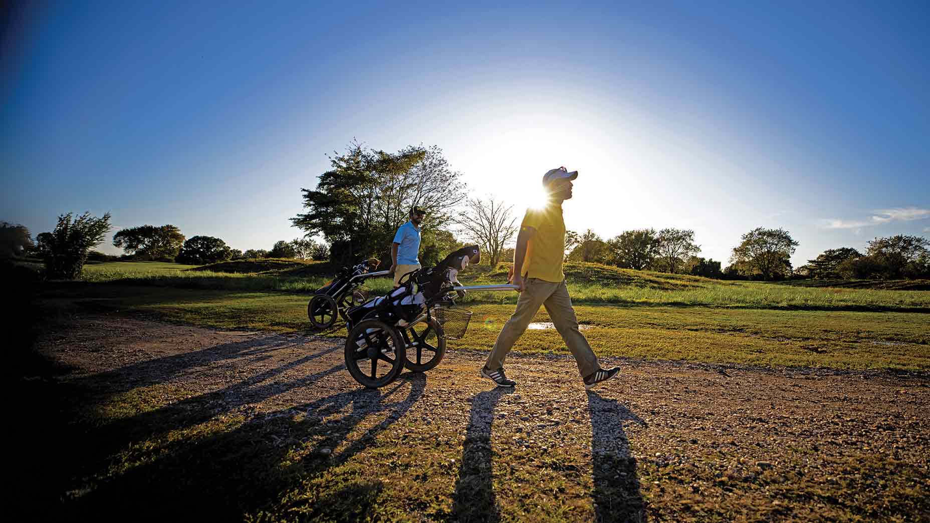 Golfers walking