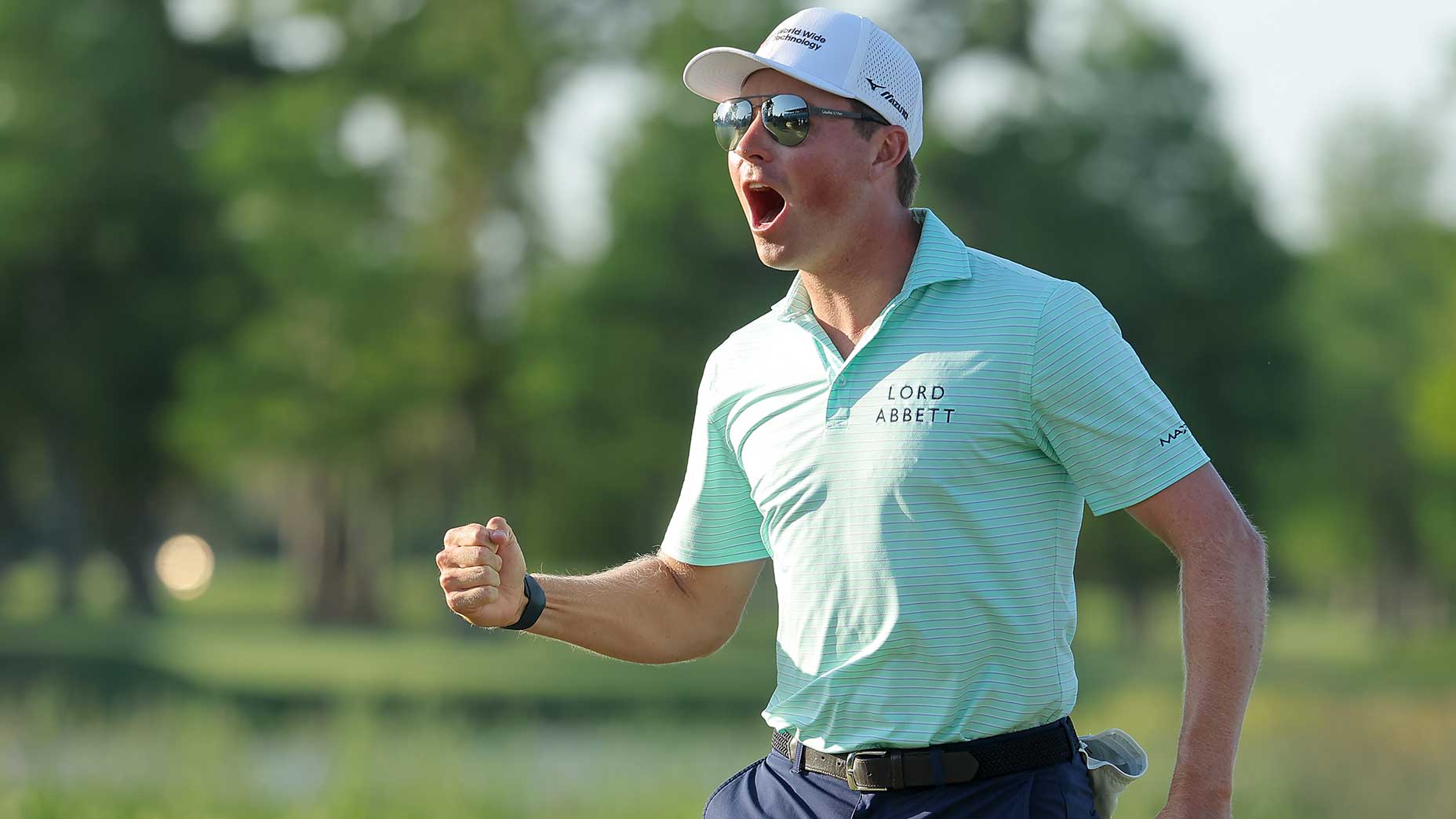 Ben Griffin celebrates after making a birdie putt on the 17th green during the final round of the Zurich Classic on Sunday.