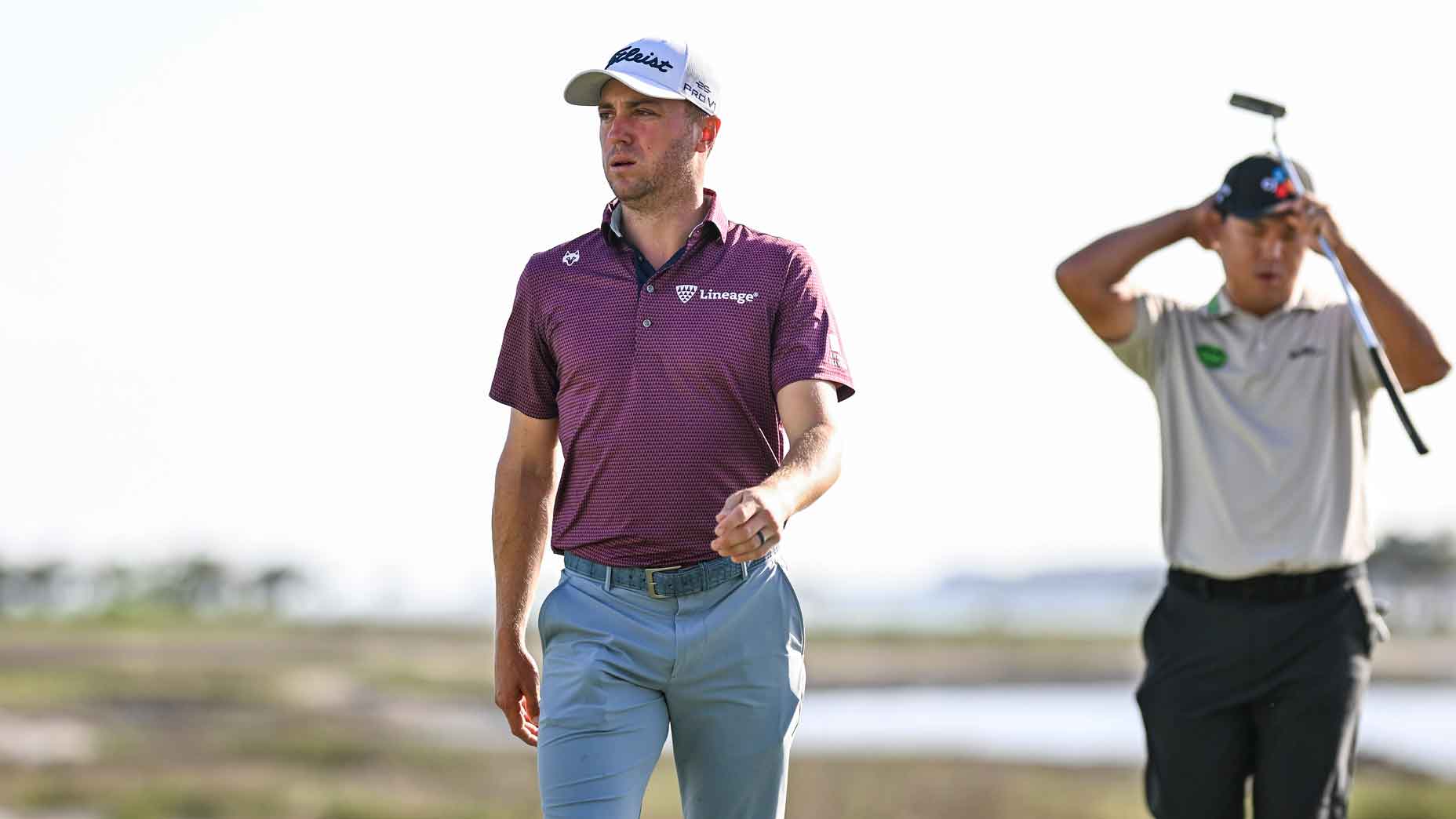 justin thomas walks in front of si woo kim at the 2025 rbc heritage