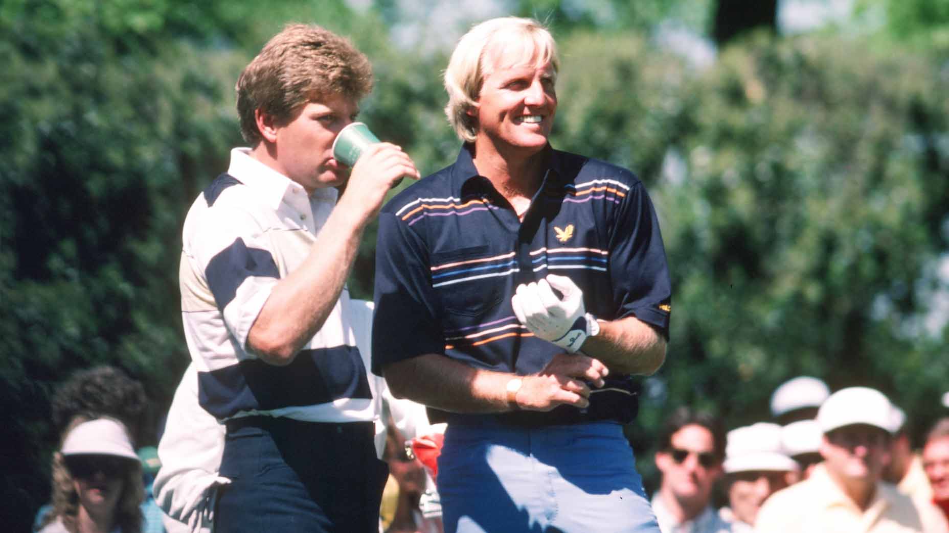 Nick Price and Greg Norman laugh during the 1986 Masters.