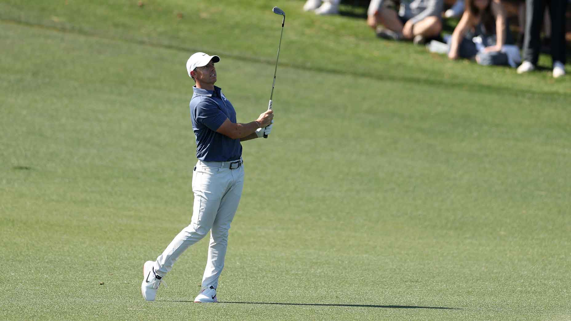 rory mcilroy hits a wedge during the 2025 masters tournament
