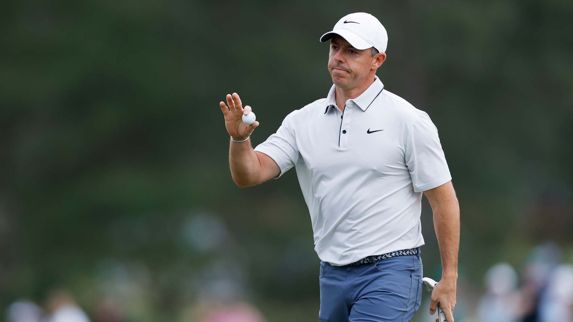 Rory McIlroy acknowledges the Augusta National crowd at the 2025 Masters.