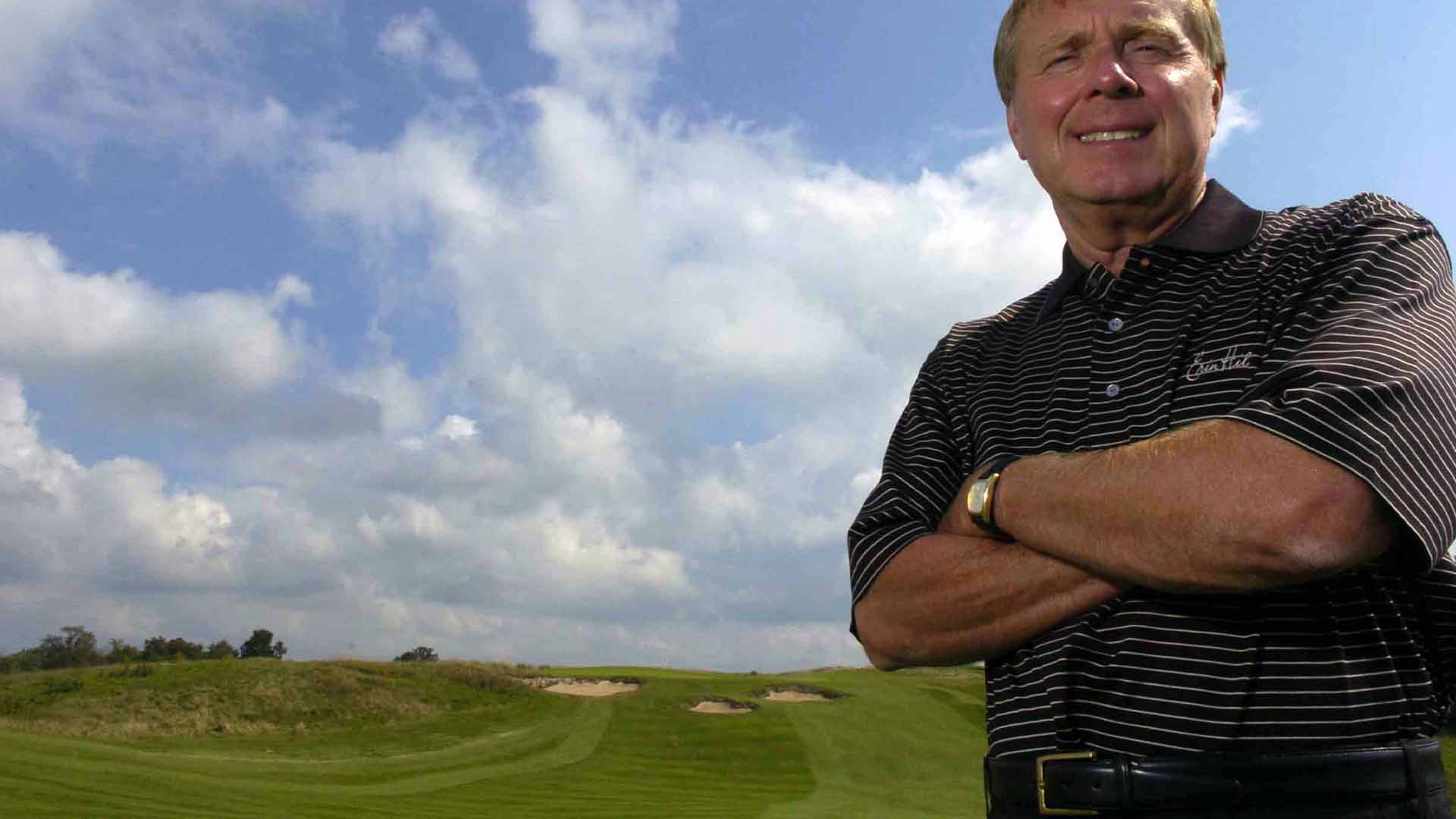 Erin Hills founder Bob Lang stands on his course in 2006