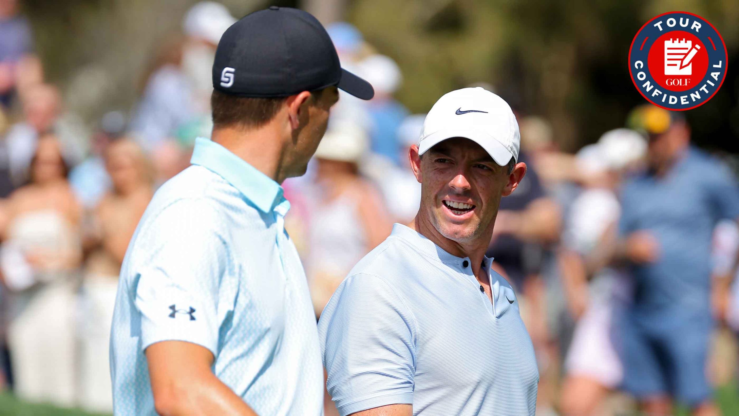 Jordan Spieth of the United States and Rory McIlroy of Northern Ireland walks off the seventh green during the second round of THE PLAYERS Championship