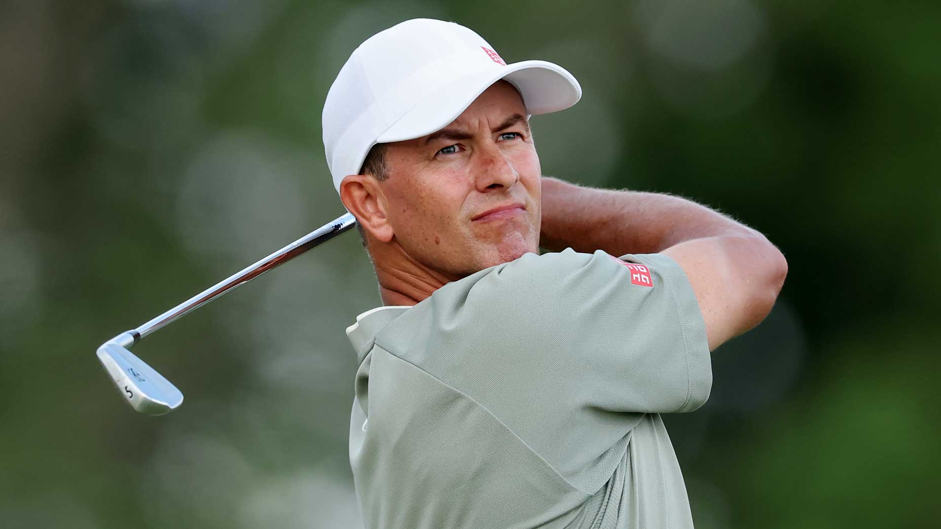 Adam Scott hits an iron at the U.S. Open.