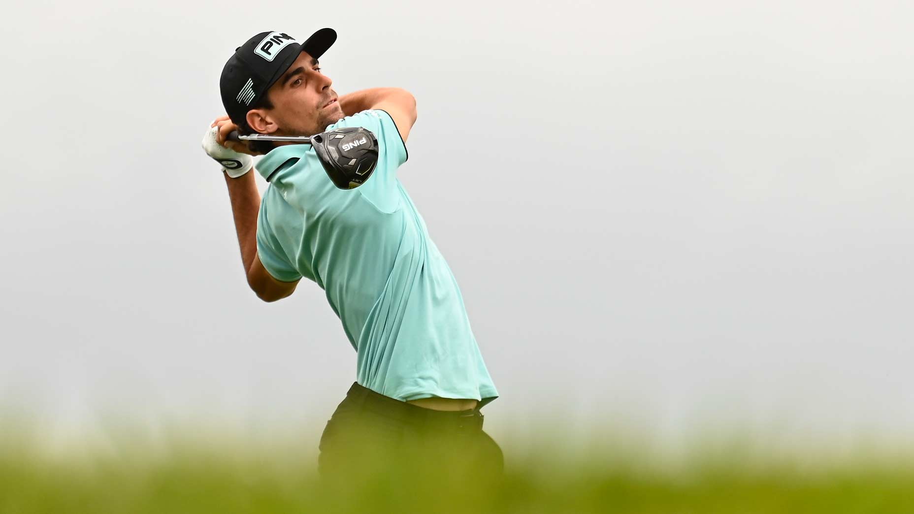 Joaquin Niemann hits a tee shot at LIV Golf Virginia.