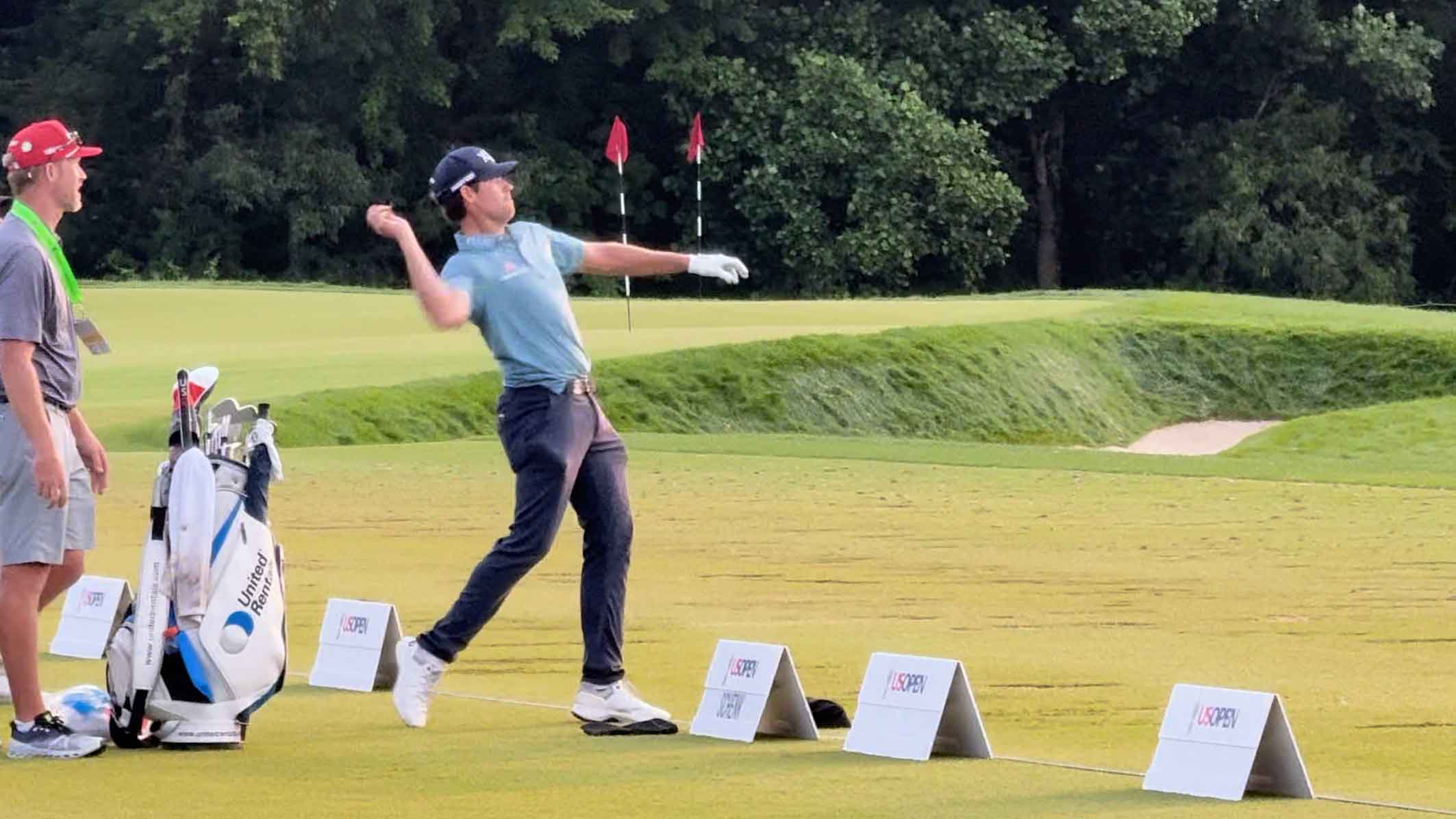 Adam Schenk throwing balls down range at U.S. Open