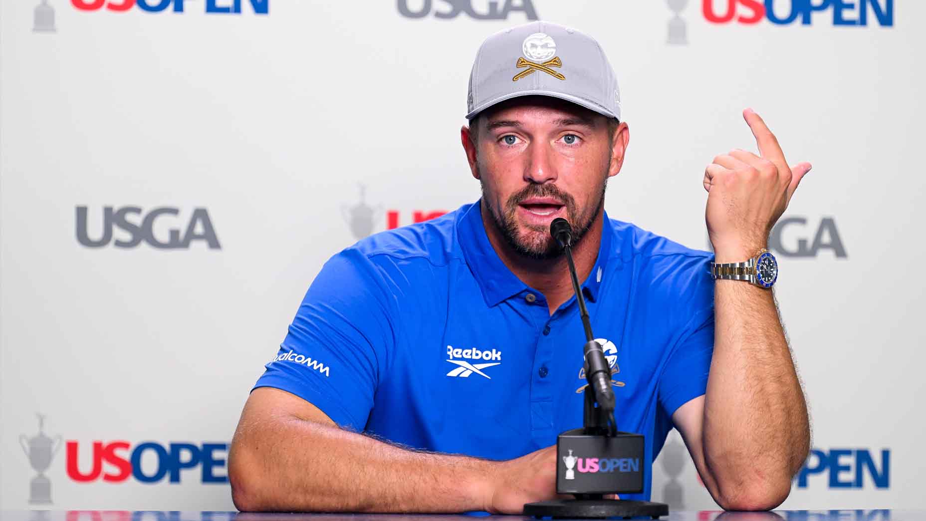 Bryson DeChambeau talks during his pre-tournament press conference at the 2025 U.S. Open