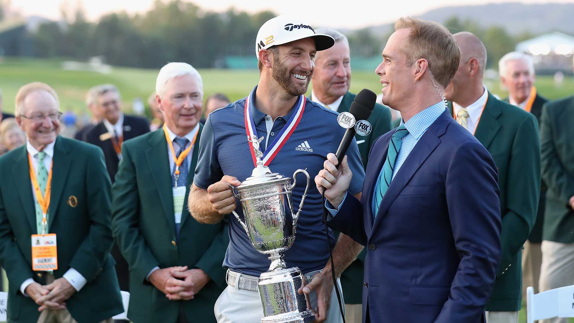Dustin Johnson speaks with Joe Buck after winning the U.S. Open at Oakmont Country Club on June 19, 2016, in Oakmont, Pa.