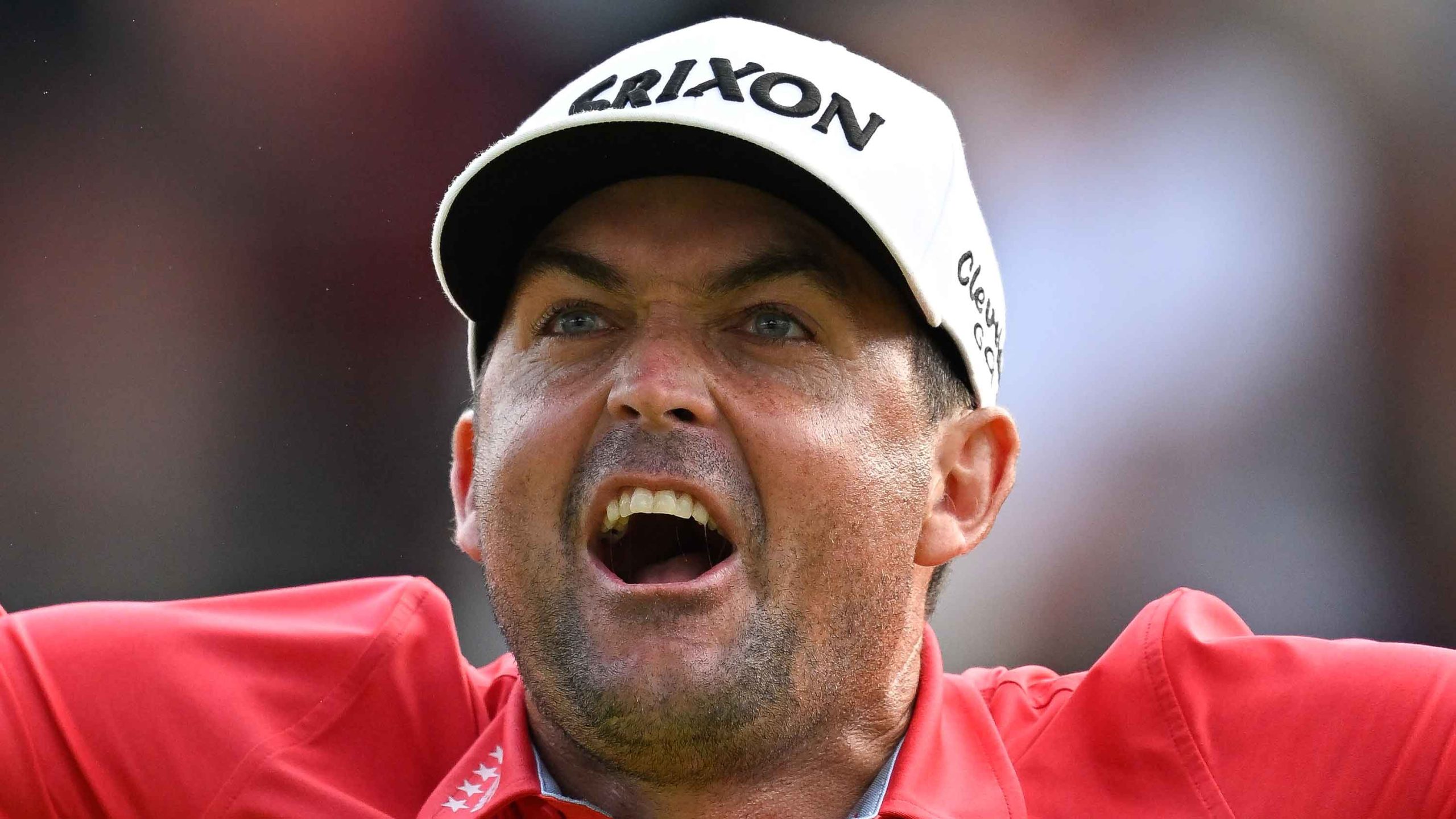 Keegan Bradley reacts to making the winning putt on the 18th green during the final round of the Travelers Championship at TPC River Highlands