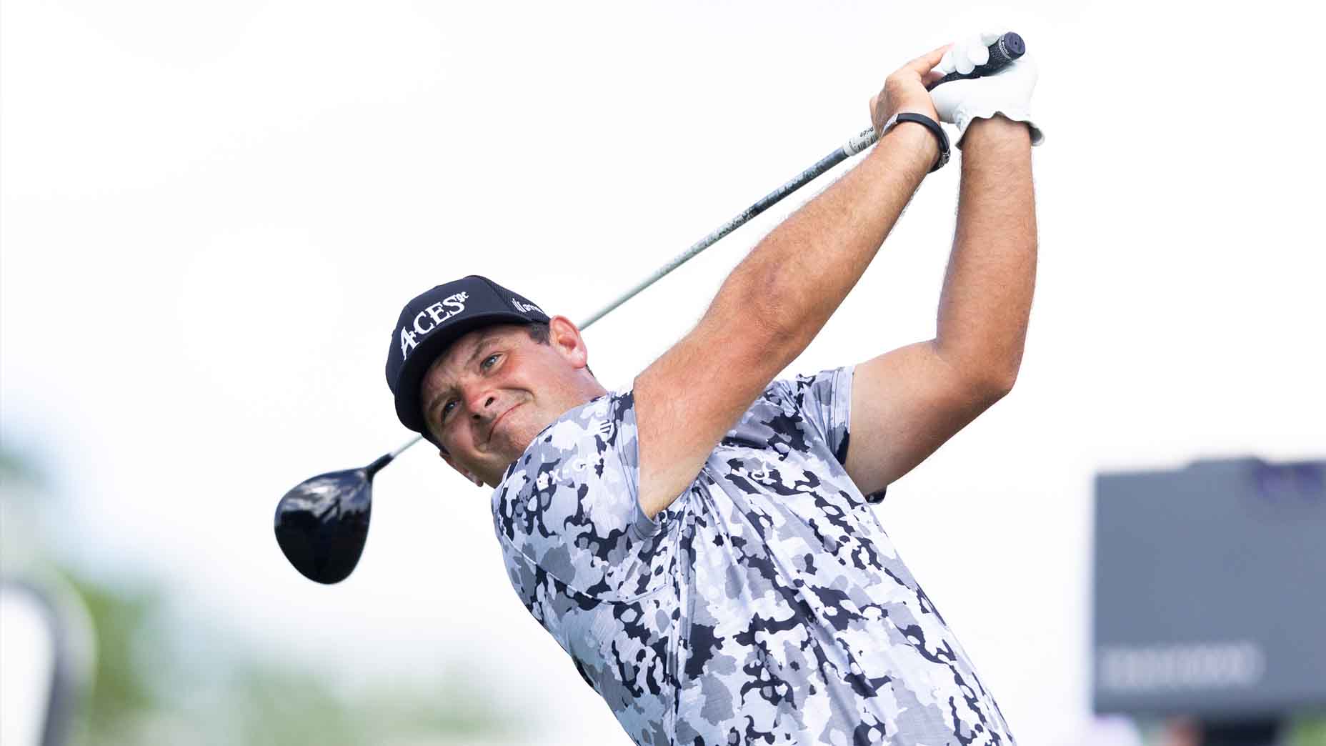Patrick Reed hits a tee shot during LIV Dallas