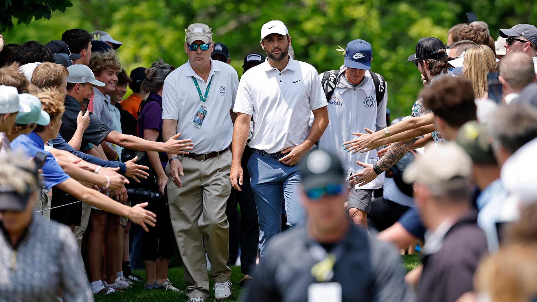 Scottie Scheffler walks off the tee during the final round of the Memorial.