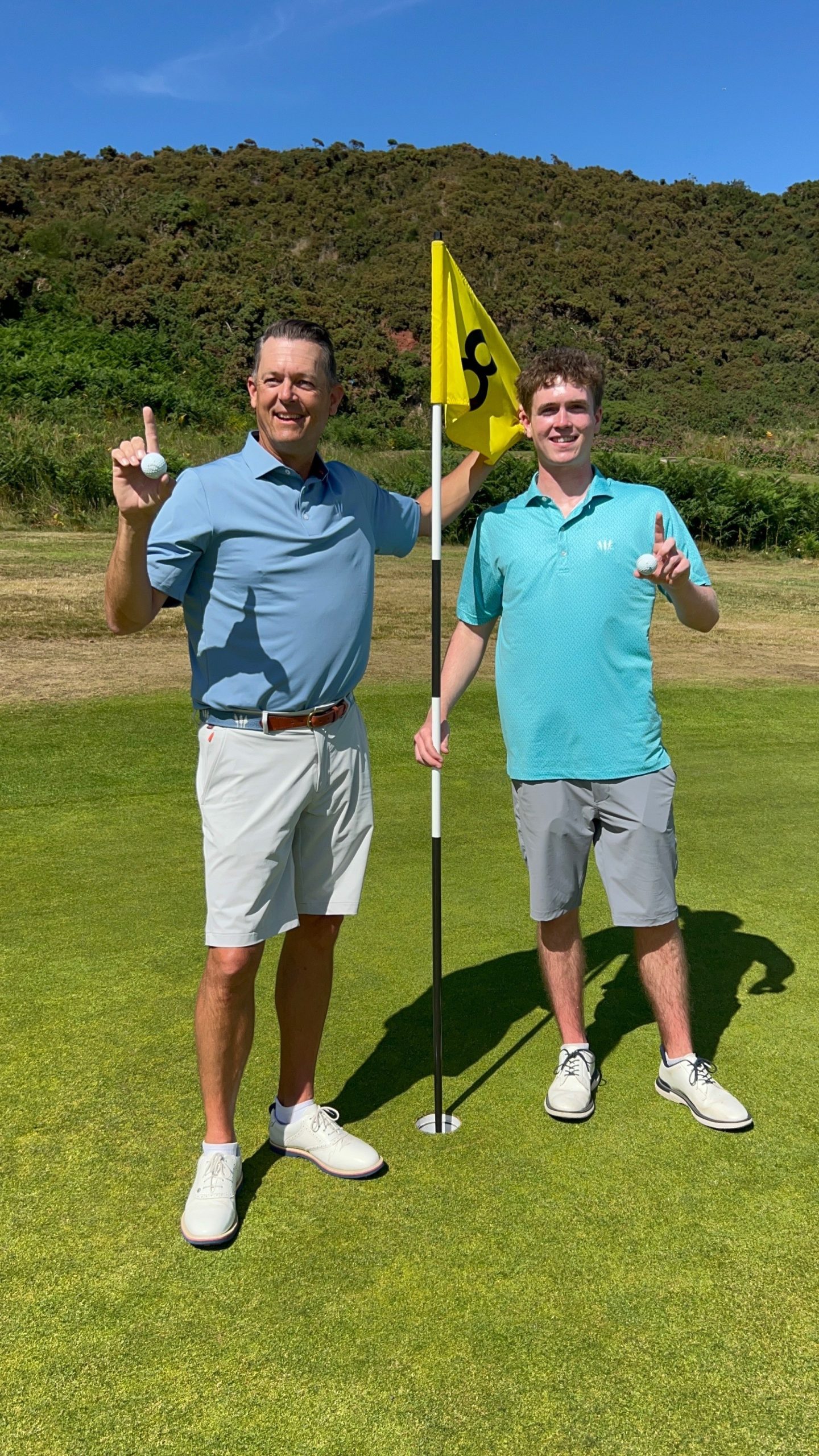 Jim and Blake Rohrstaff after making double aces at Cullen Links