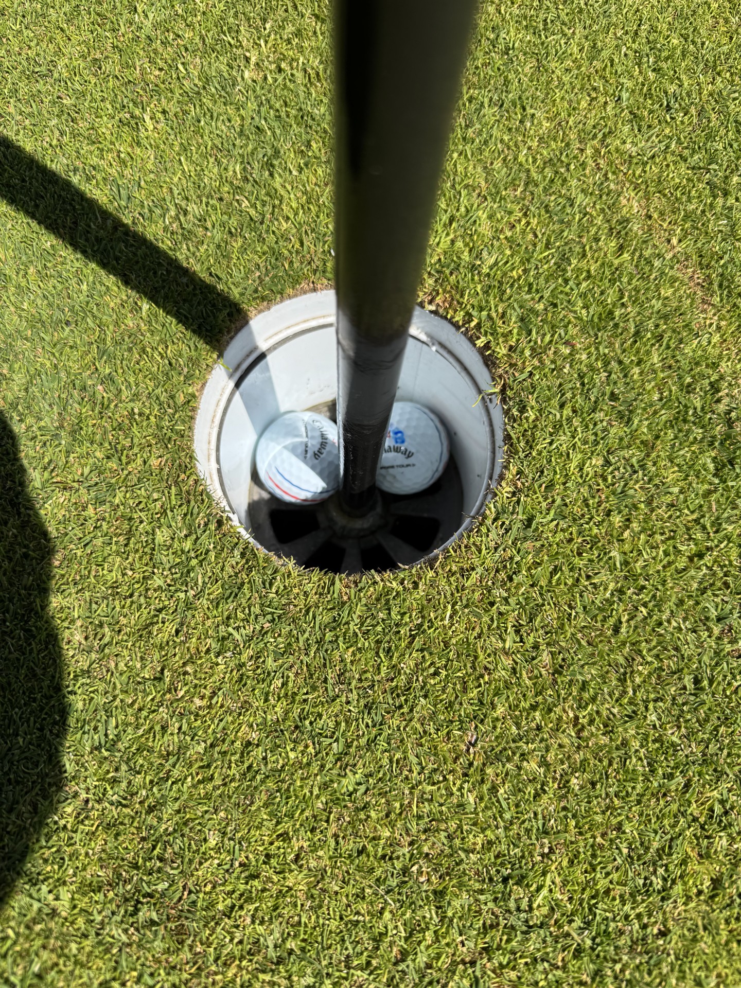 Two balls in the eighth hole at Cullen Links