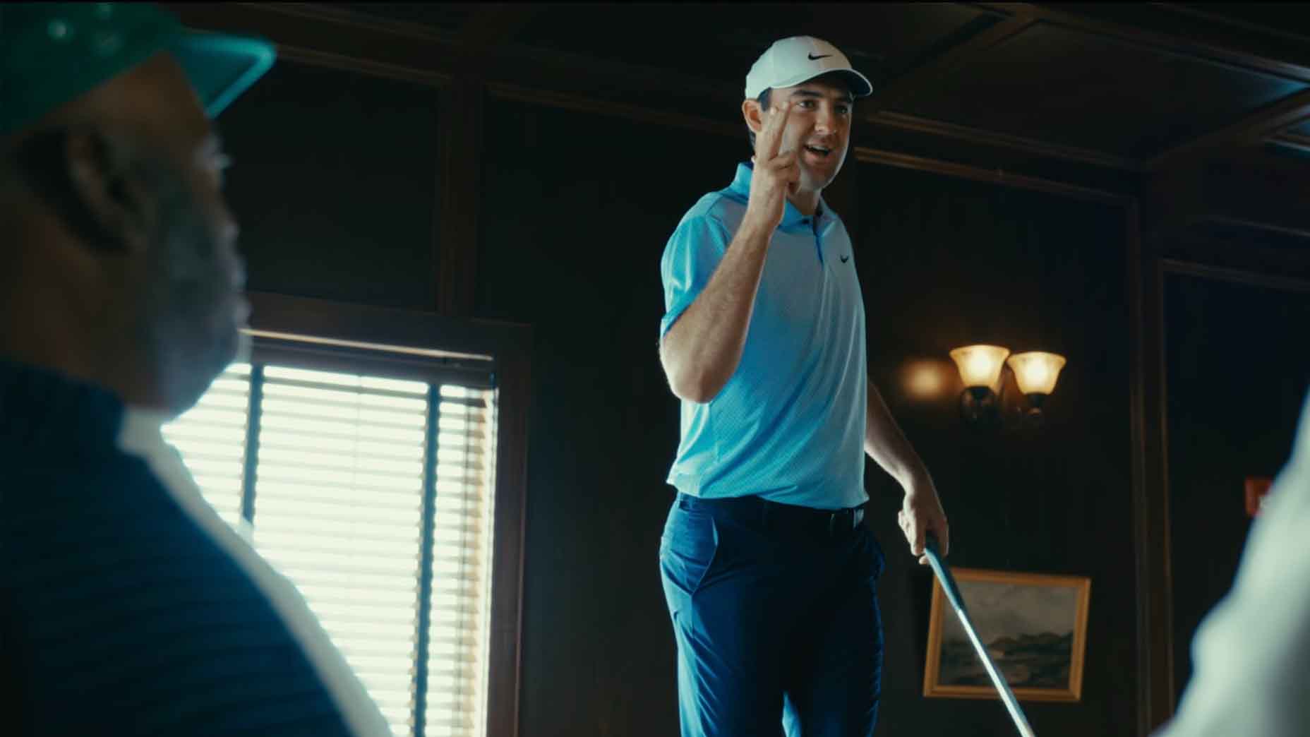 Scottie Scheffler mimics shooting a gun during Happy Gilmore 2