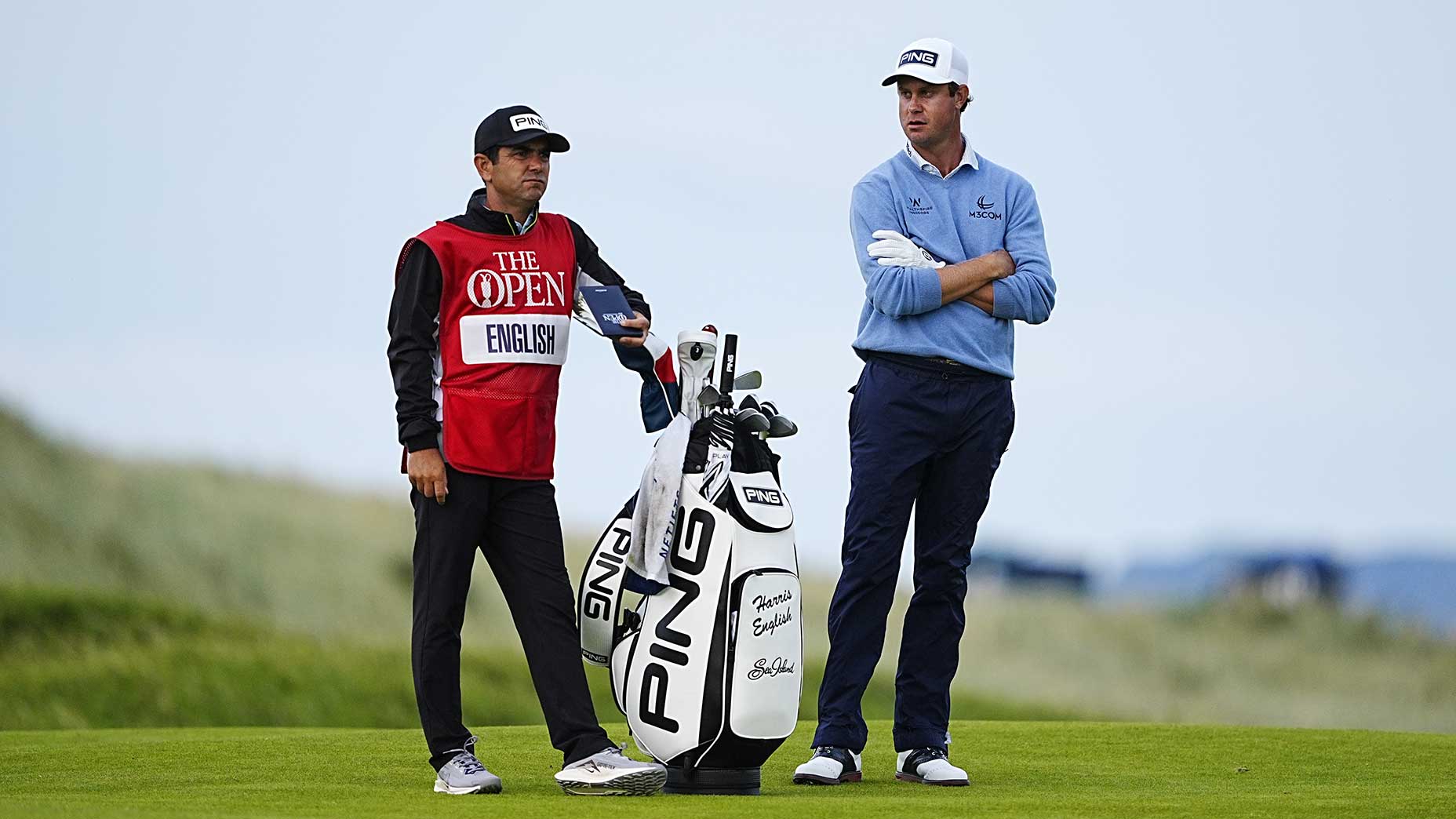 Harris English and fill-in caddie Ramon Bescansa wait on the 17th fairway during the first round of the Open Championship on Thursday.