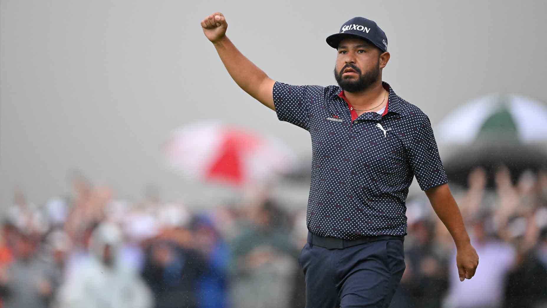 J.J. Spaun pumps his fist after making the winning putt at the 2025 U.S. Open