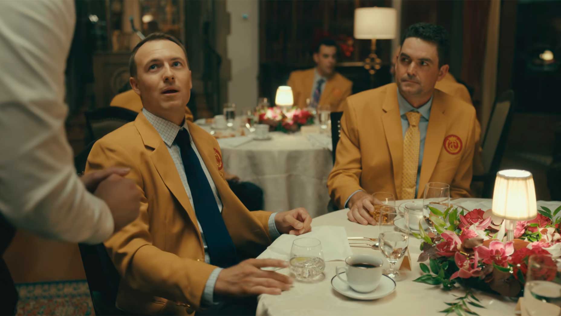 Jordan Spieth (with Keegan Bradley next to him) at dinner during 