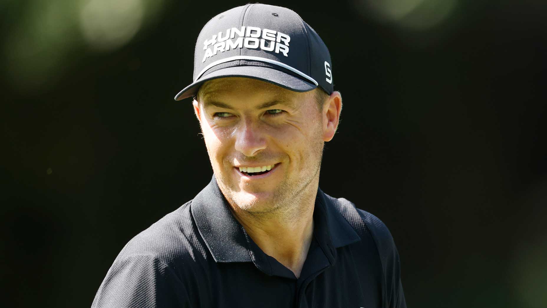 Former U.S. Ryder Cup member Jordan Spieth smiles at the 2025 Wyndham Championship.