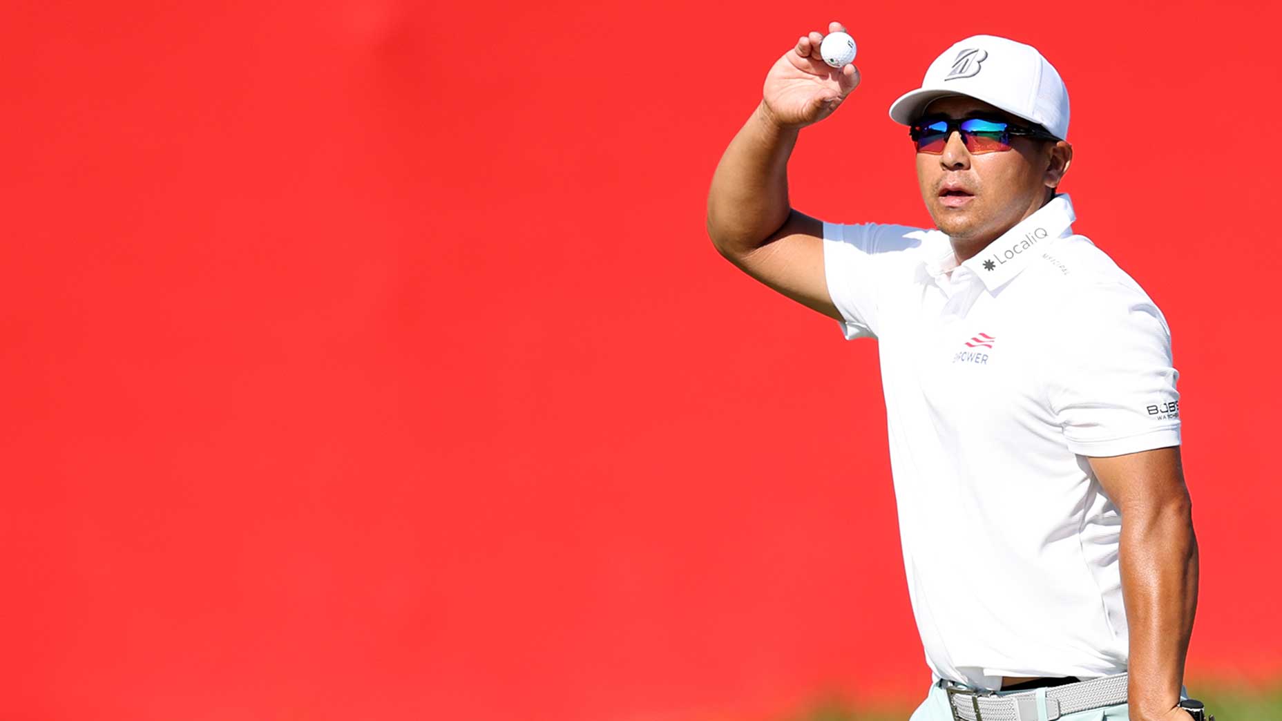 Kurt Kitayama waves to the crowd during the final round of the 3M Open on Sunday in Blaine, Minn.