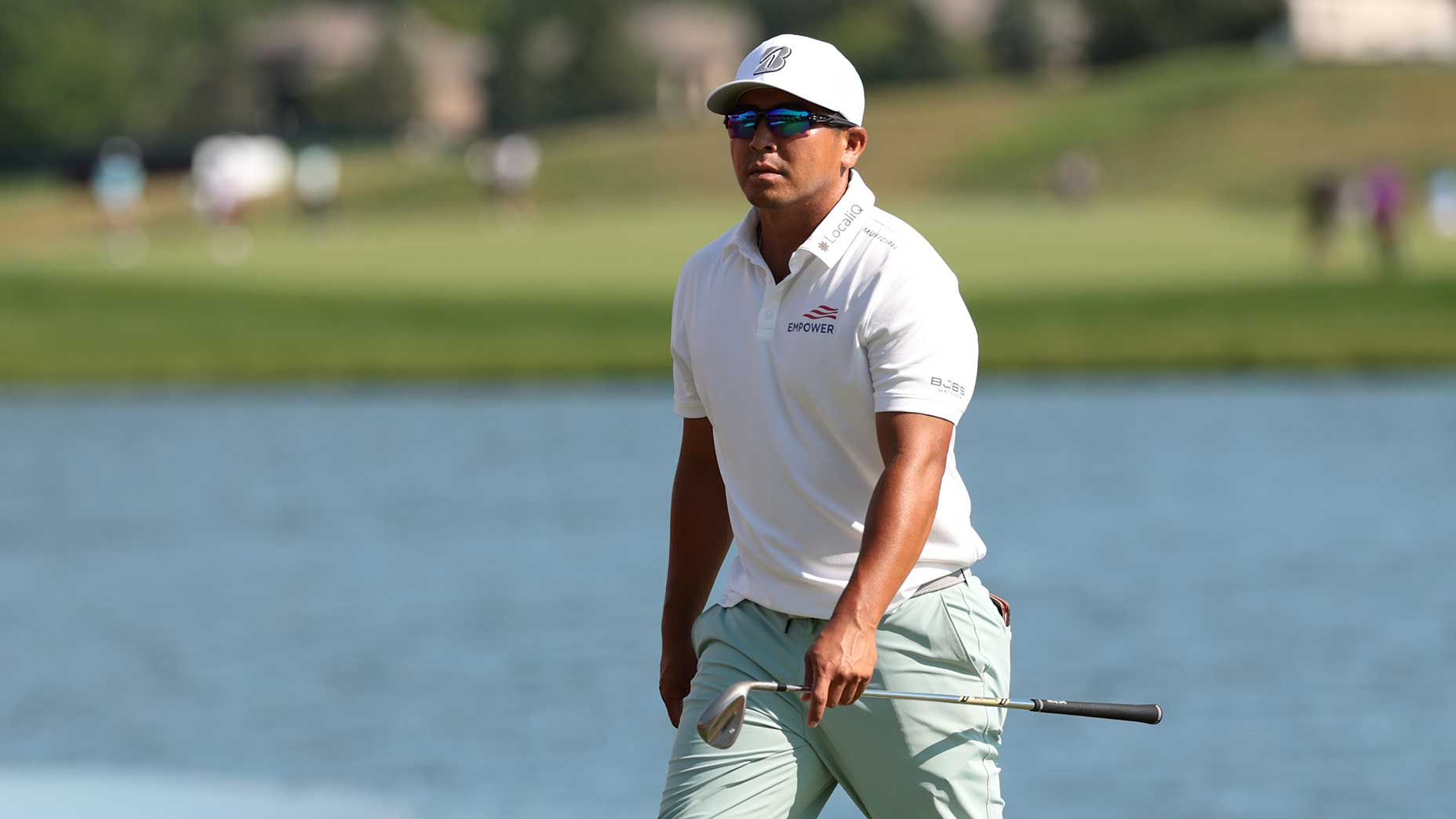 Kurt Kitayama walks to the green at the 3m open