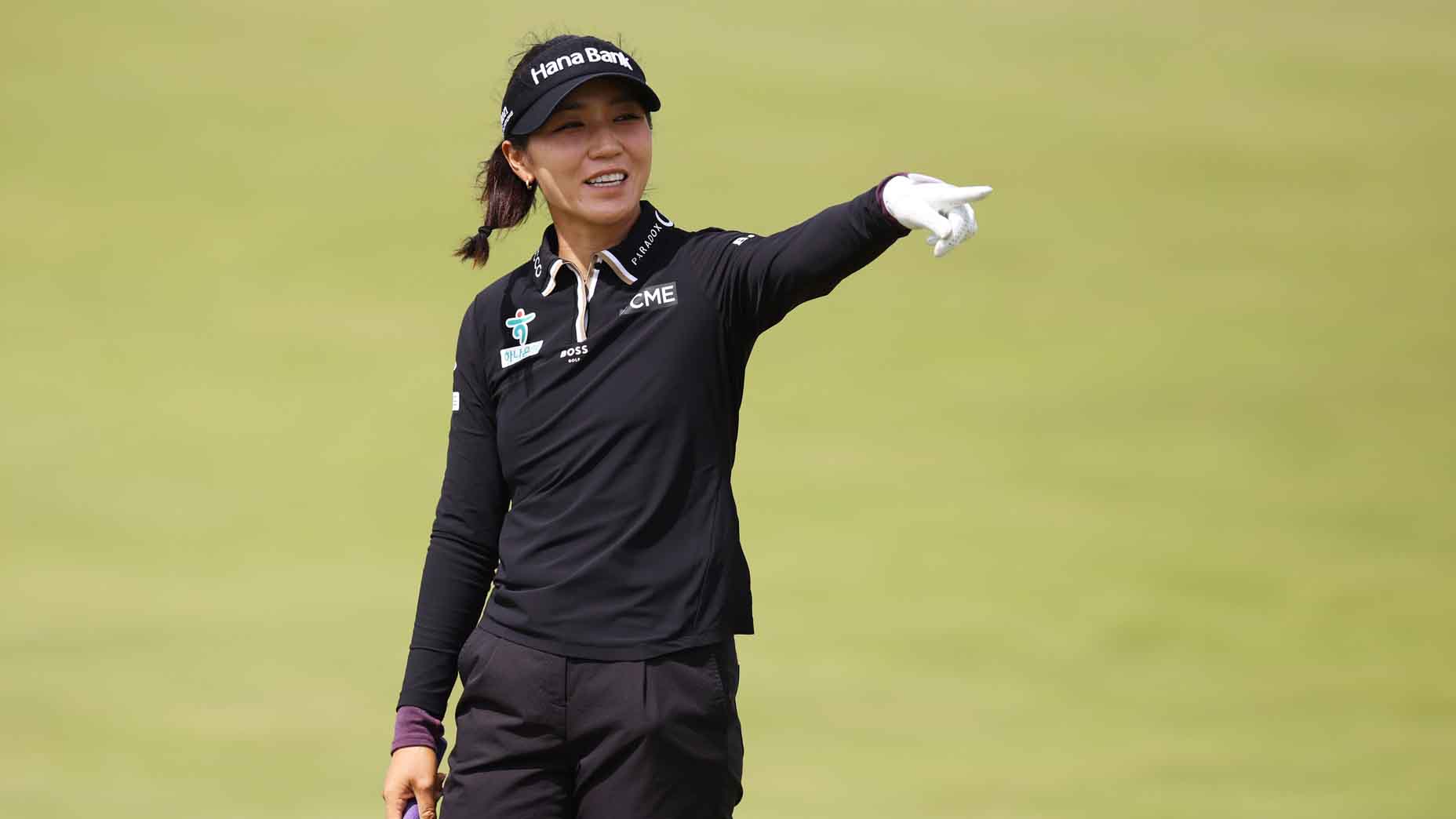 Lydia Ko points during the AIG Women's Open pro-am
