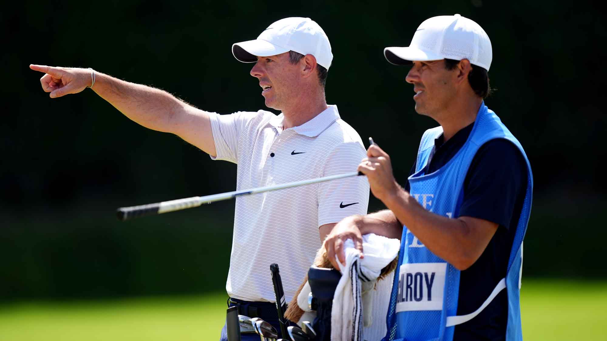 PGA Tour pro Rory McIlroy and caddie Harry Diamond during a practice round ahead of the 2025 Open Championship at Royal Portrush.