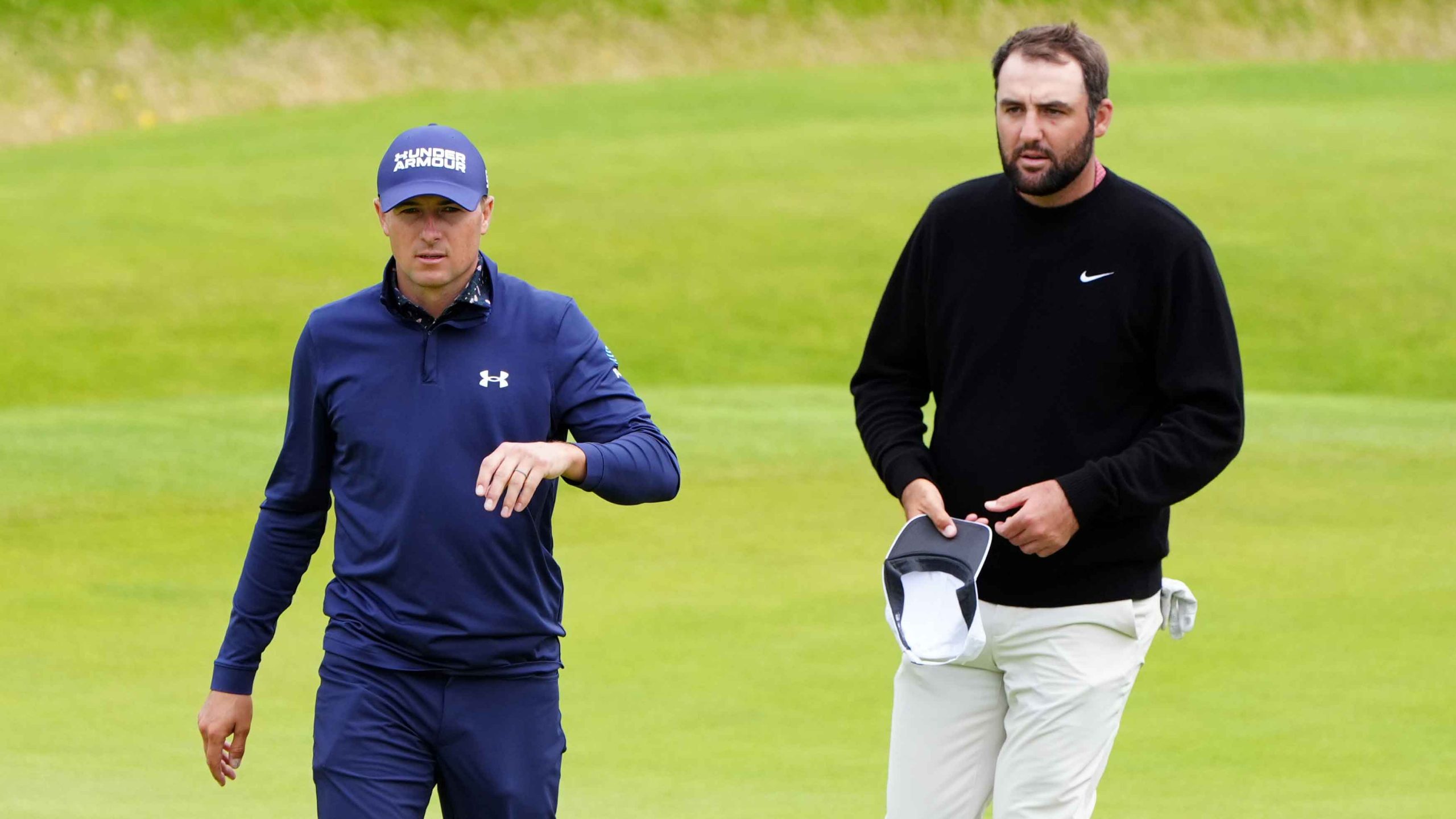 Jordan Spieth and USA's Scottie Scheffler after their rounds on the 18th during day two of The Open at Royal Troon,