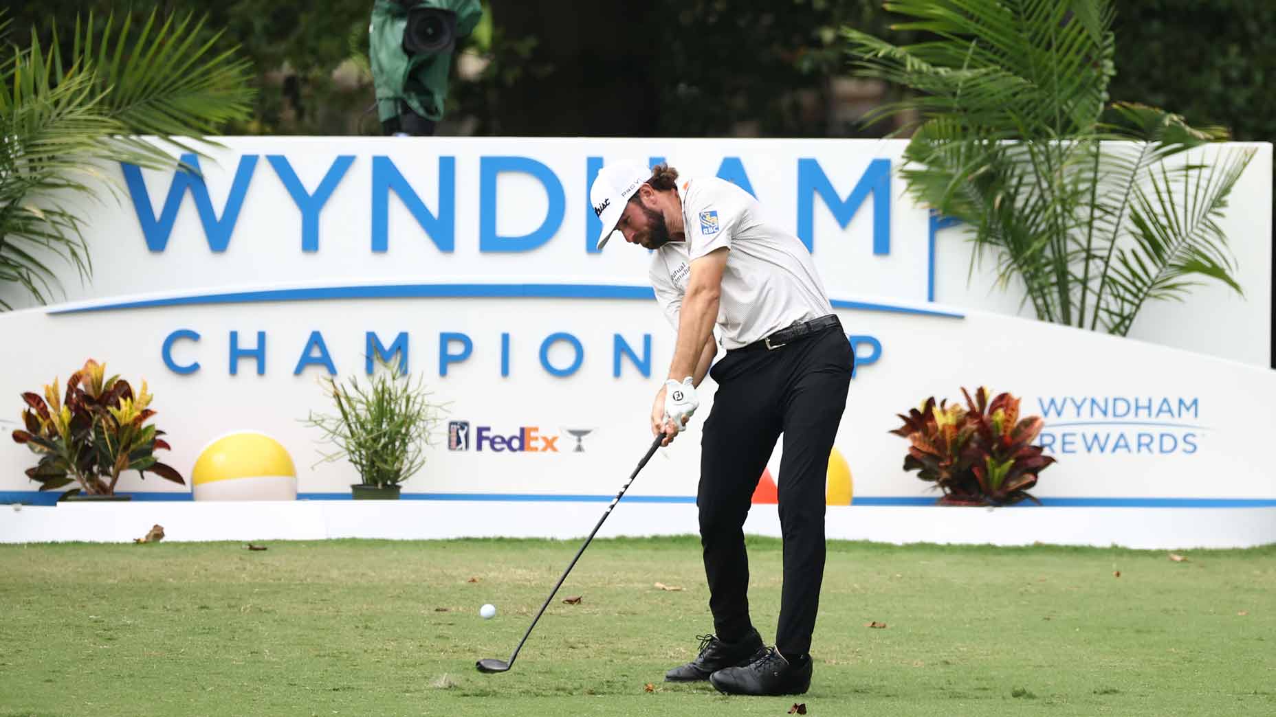 Cameron Young plays a tee shot at the Wyndham Championship.