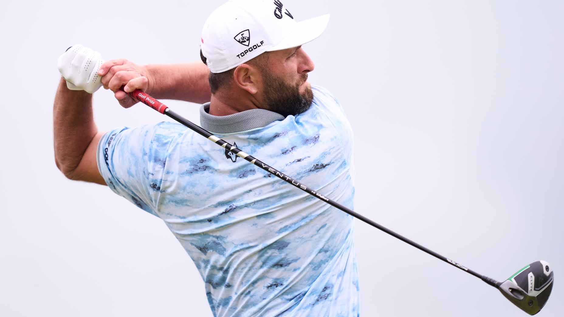 Jon Rahm hits a tee shot at the Open.