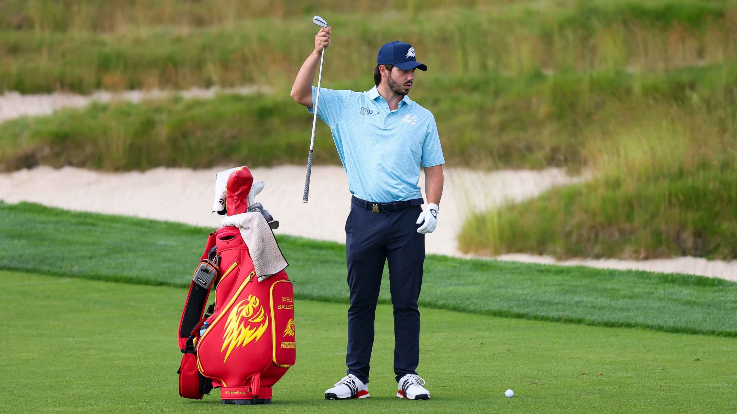Jose Luis Ballester Barrio of Spain selects a club from his bag on the third hole during a practice round prior to the 125th U.S. OPEN