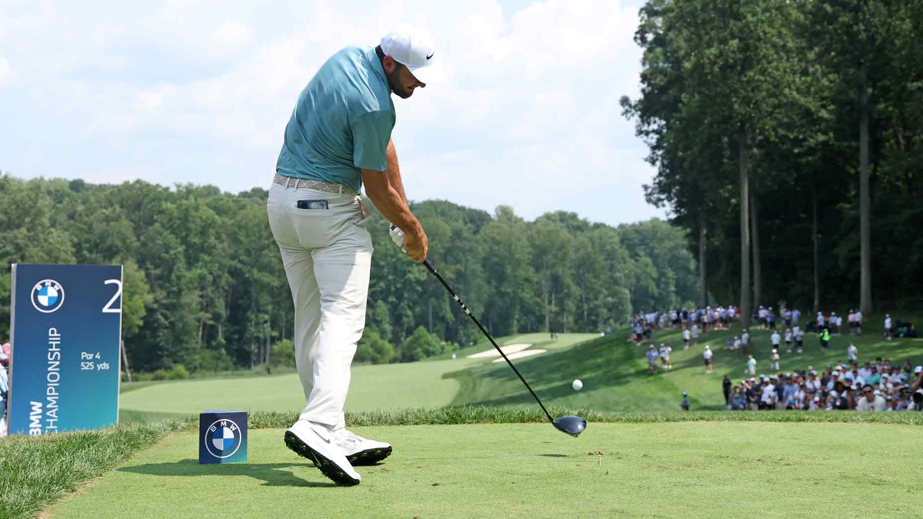 Scottie Scheffler hits a drive at the BMW Championship.