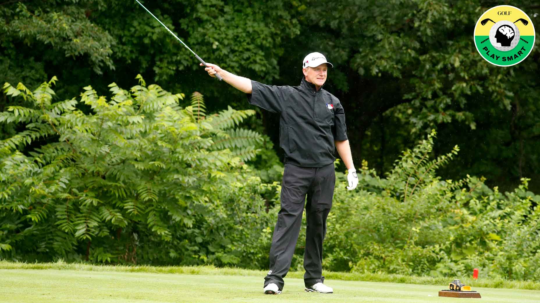 adam long points with driver during 2021 john deere classic