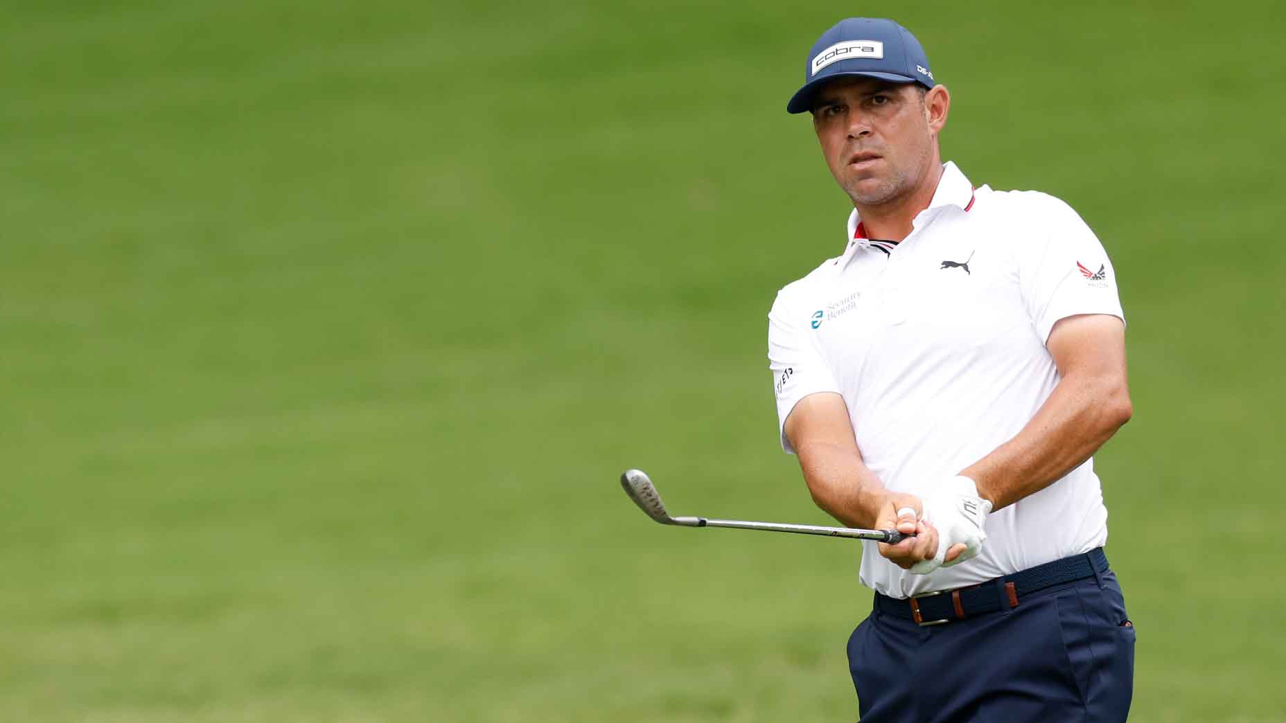 Gary Woodland plays a shot during the third round of the Wyndham Championship