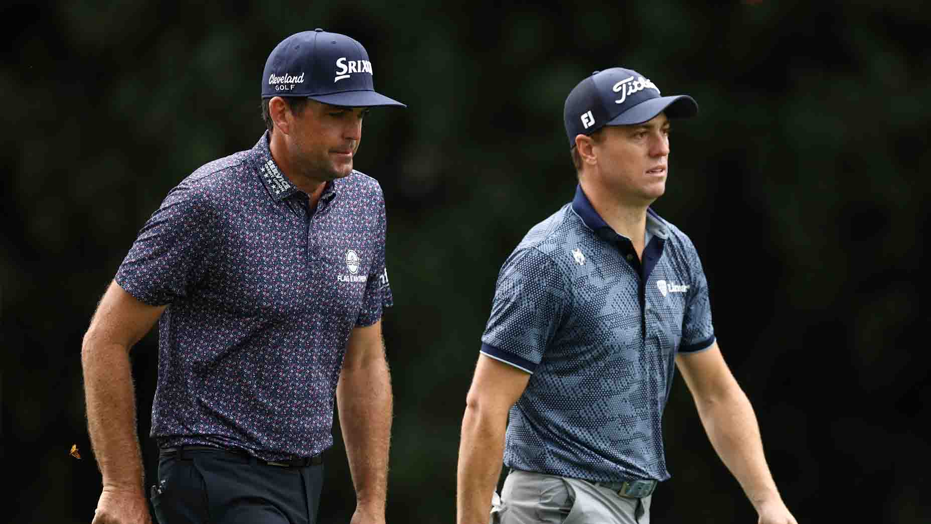 Keegan Bradley and Justin Thomas walk during the Tour Championship