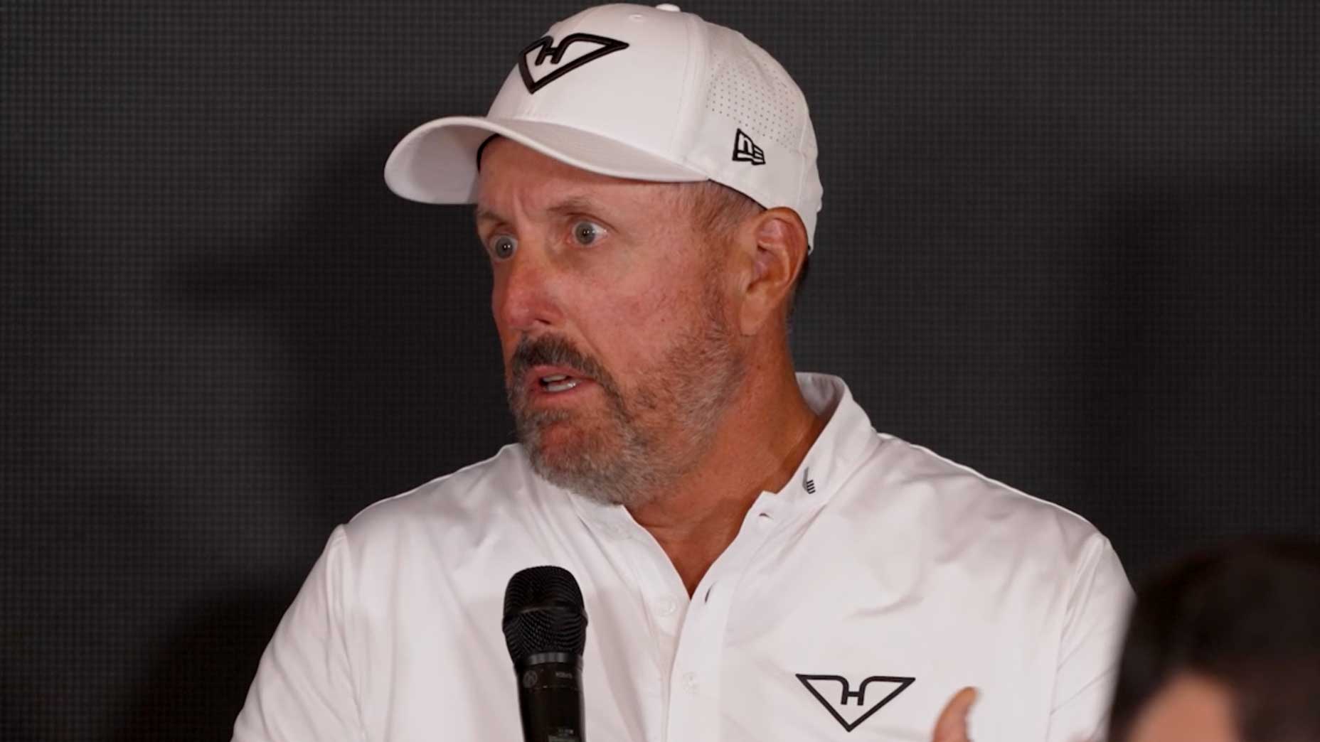 LIV Golf pro Phil Mickelson talks during his 2025 LIV Golf Michigan press conference.