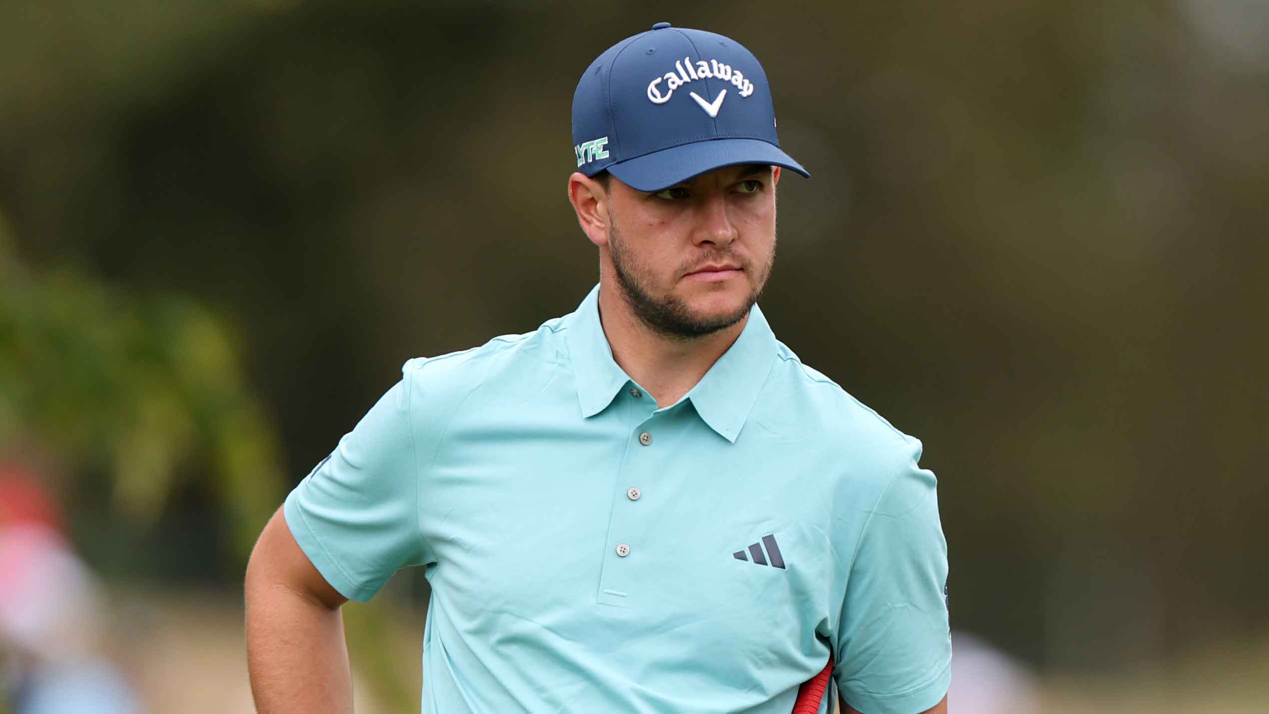 am Bairstow of England with his caddie on the seventh green on day two of the Betfred British Masters hosted by Sir Nick Faldo 2025 at The Belfry
