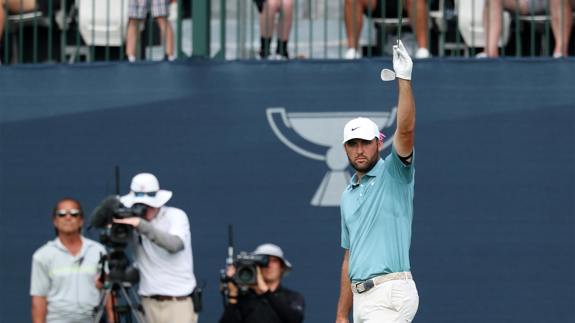 scottie scheffler raises club after chip-in at bmw championship at caves valley