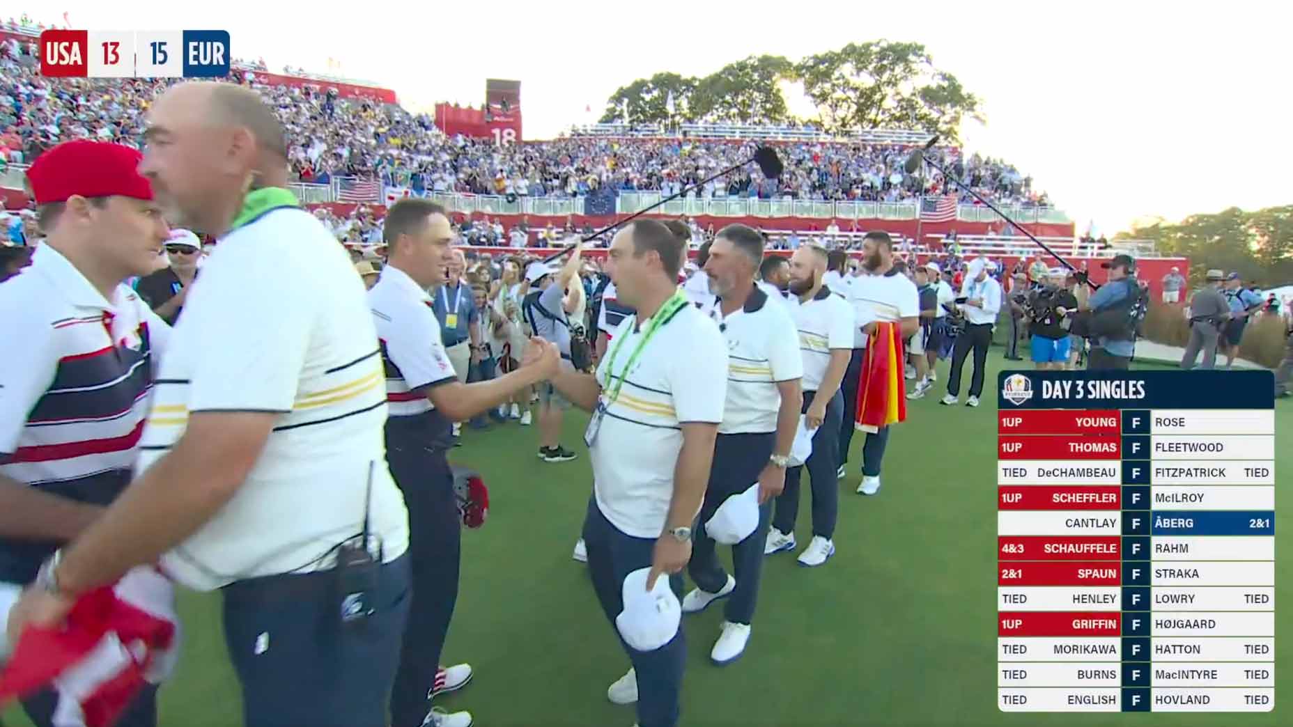 Players on both teams take part in a handshake line following the 2025 Ryder Cup at Bethpage Black.